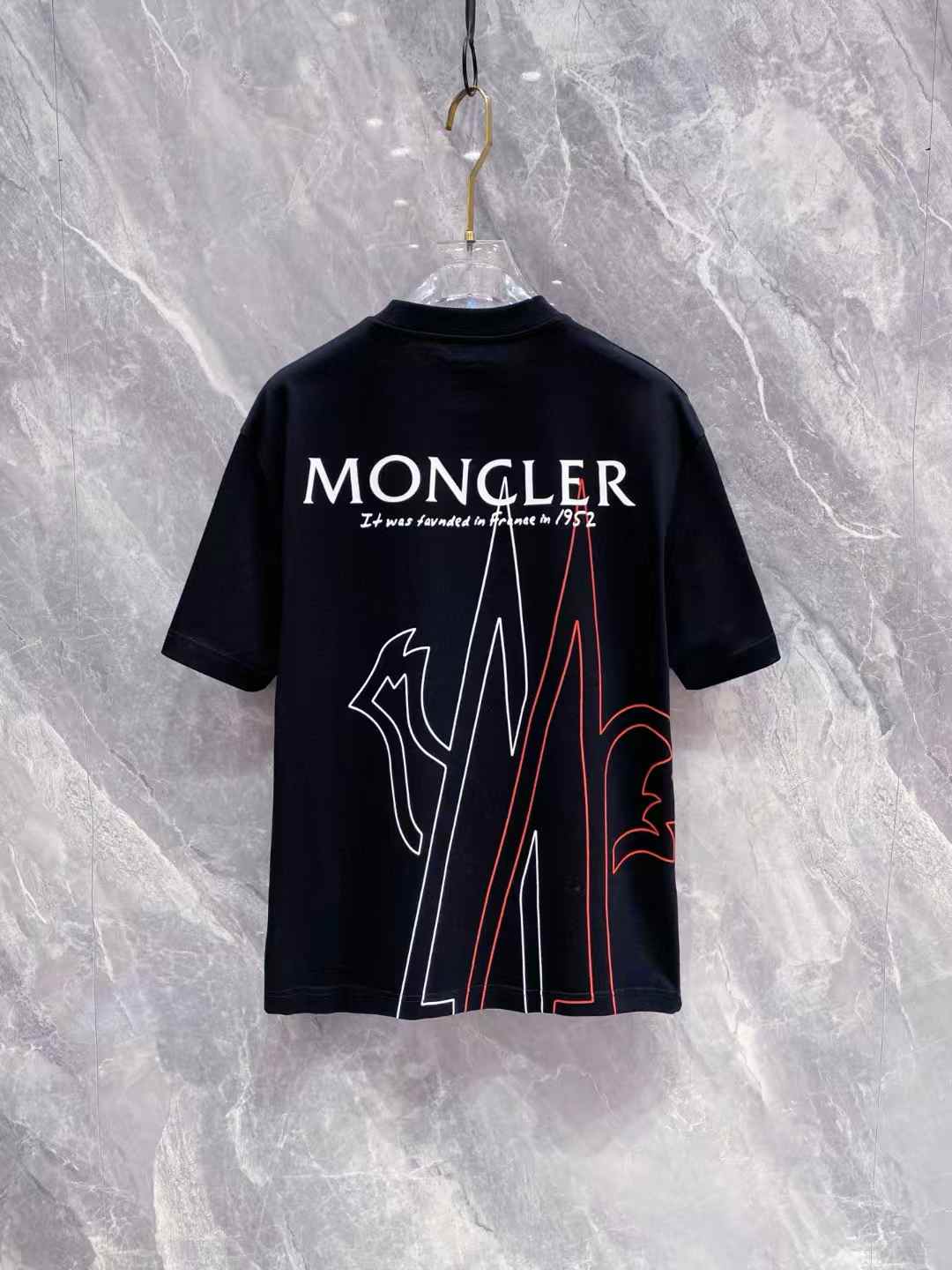 Moncler short-sleeve cotton T-shirt black with a logo patch at the chest