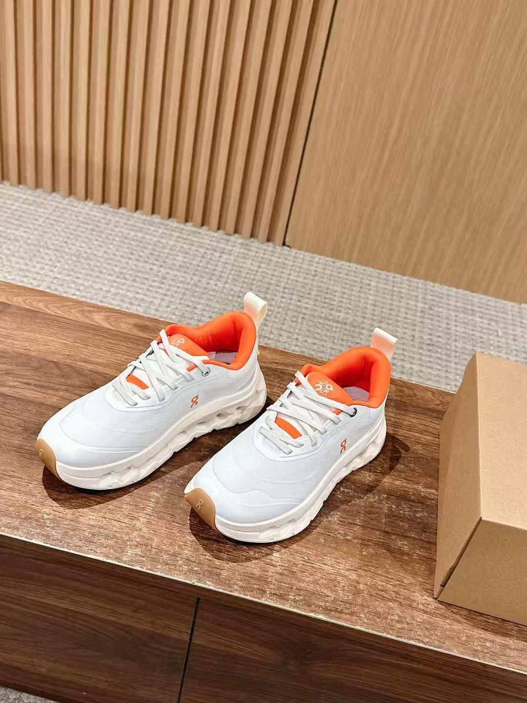 loewe On Running x Cloudtilt 2.0 sneakers in the white and orange colorway