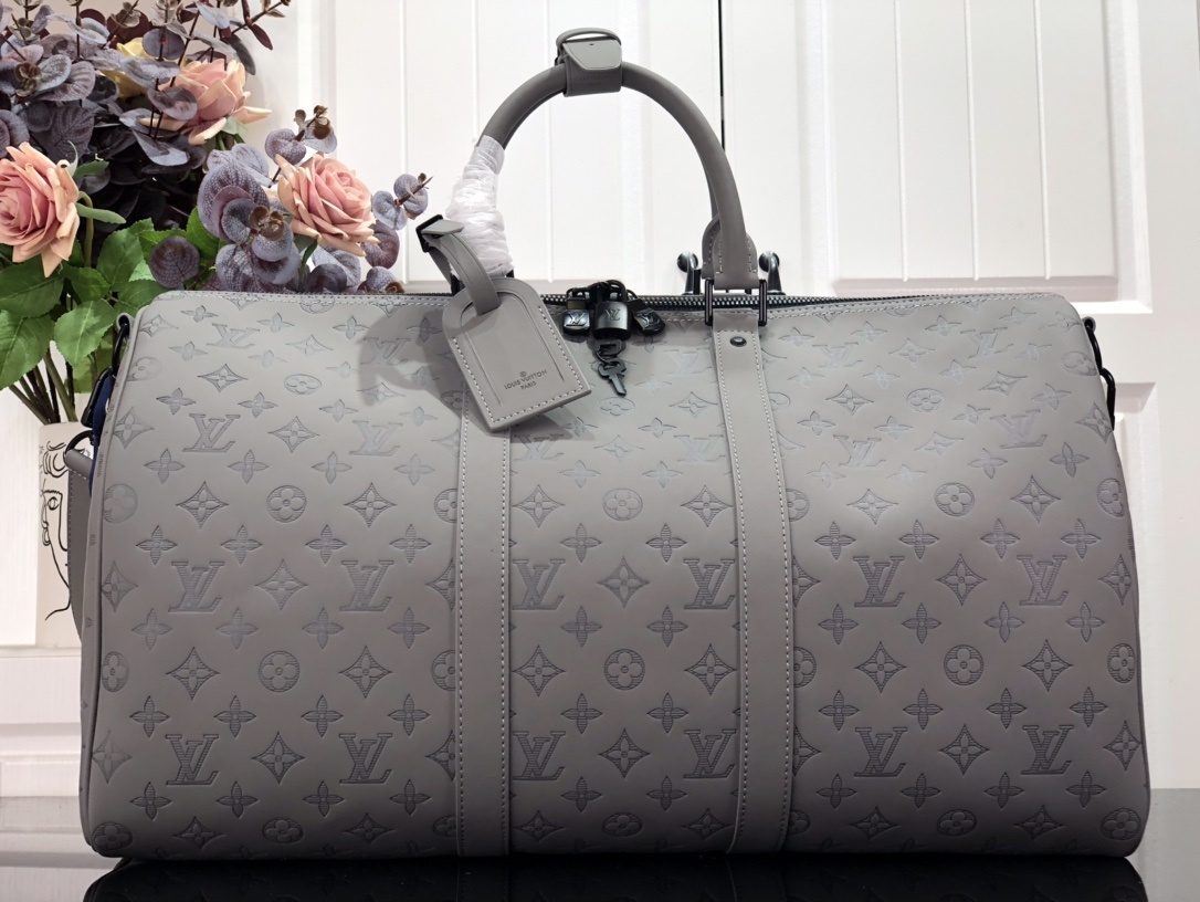 LV Keepall Bandoulière 50 travel bag in gray Monogram Shadow embossed calf leather