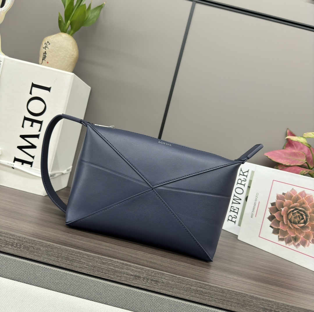 Loewe Puzzle Fold pouch in navy blue leather