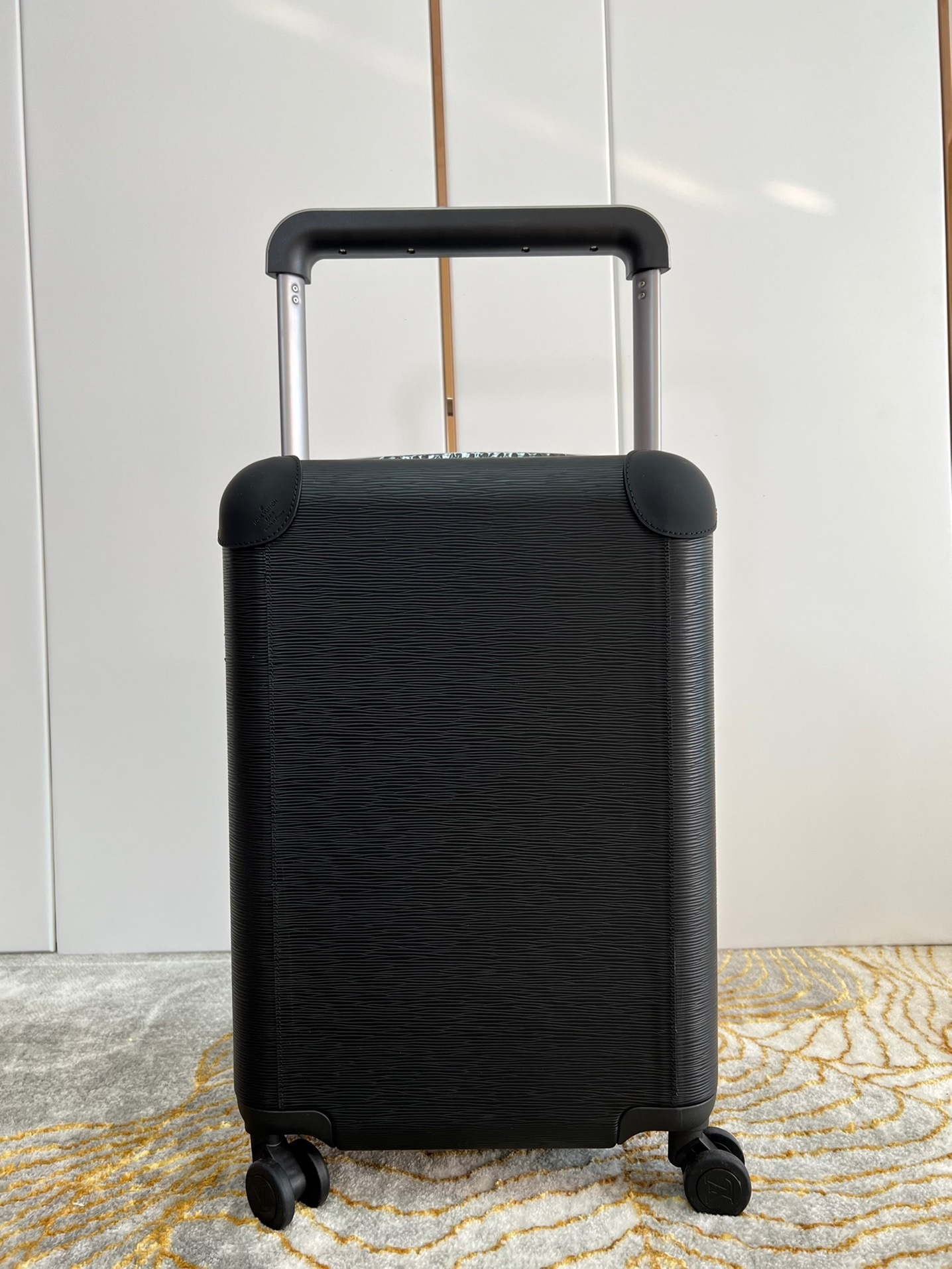 LV Horizon 55 rolling suitcase in black leather