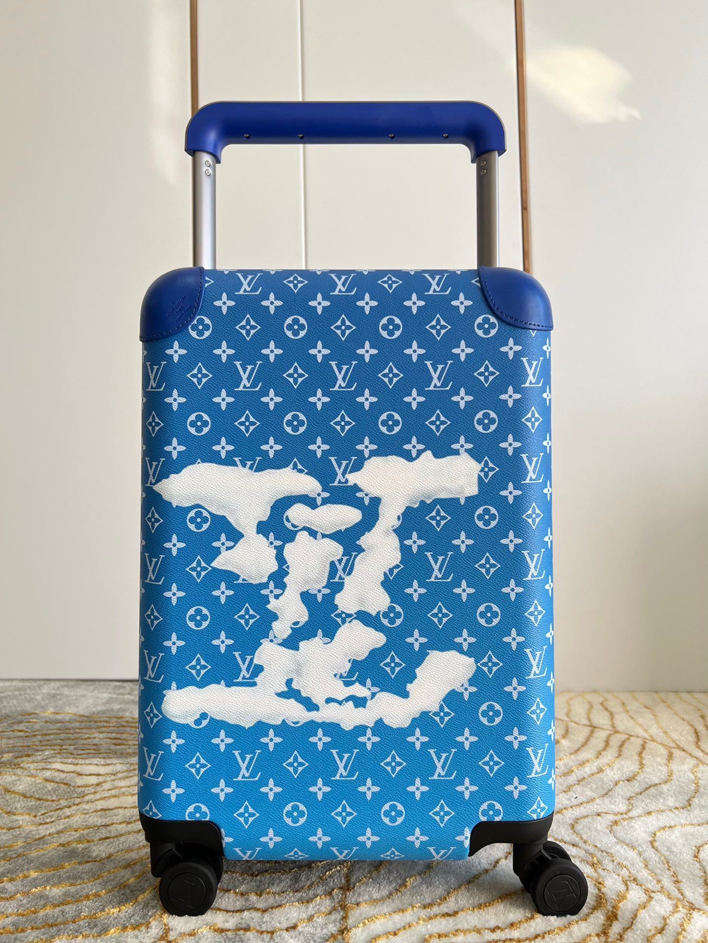 LV Horizon 55 rolling suitcase with a blue Monogram canvas