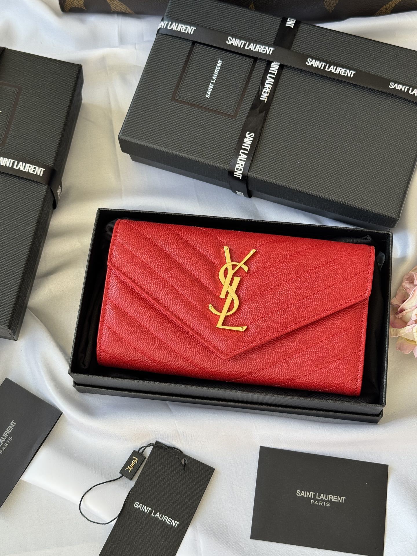 Saint Laurent large envelope flap wallet in red