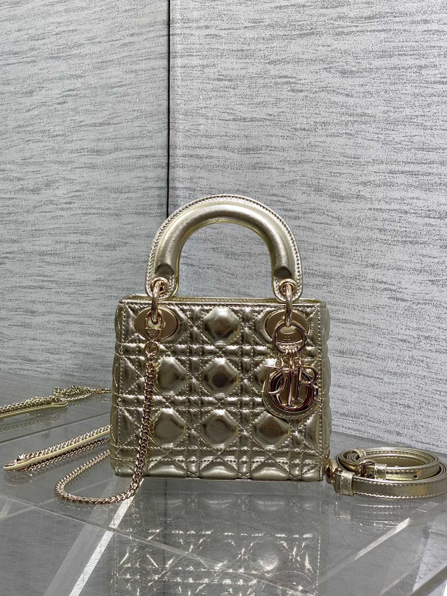 Dior D-Joy bag in metallic pale gold-tone cannage calfskin with pale gold-finish