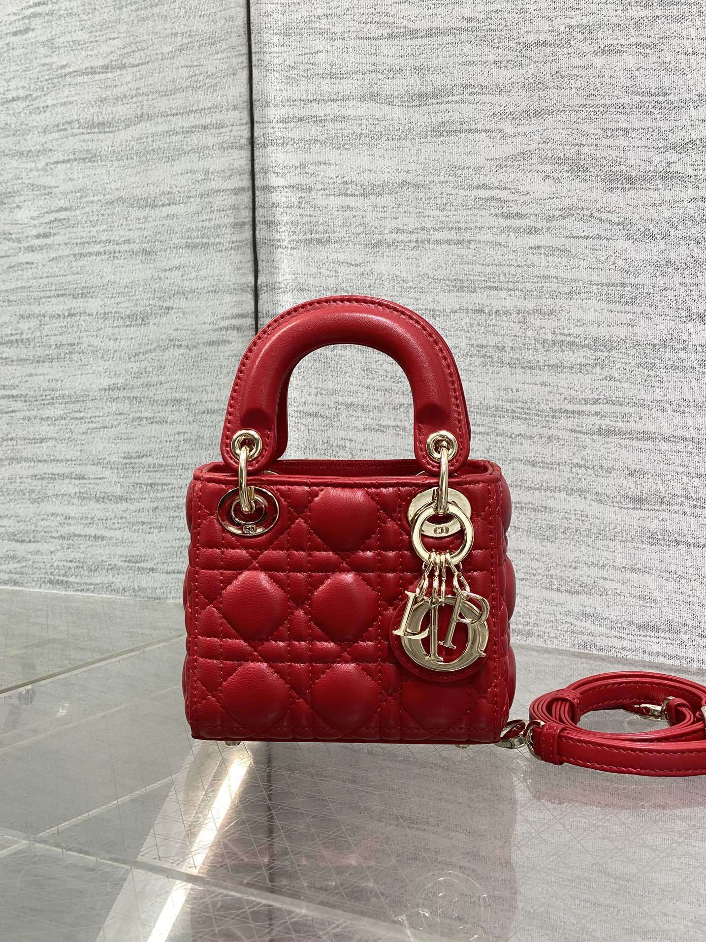 Dior Lady Dior Micro or Mini bag in red lambskin Leather