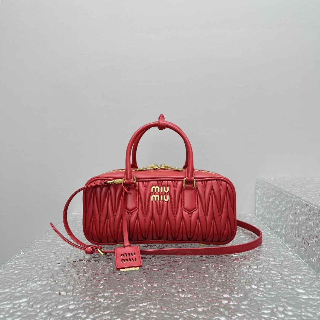 Miu Miu Arcadie matelassé leather bag in bright red.