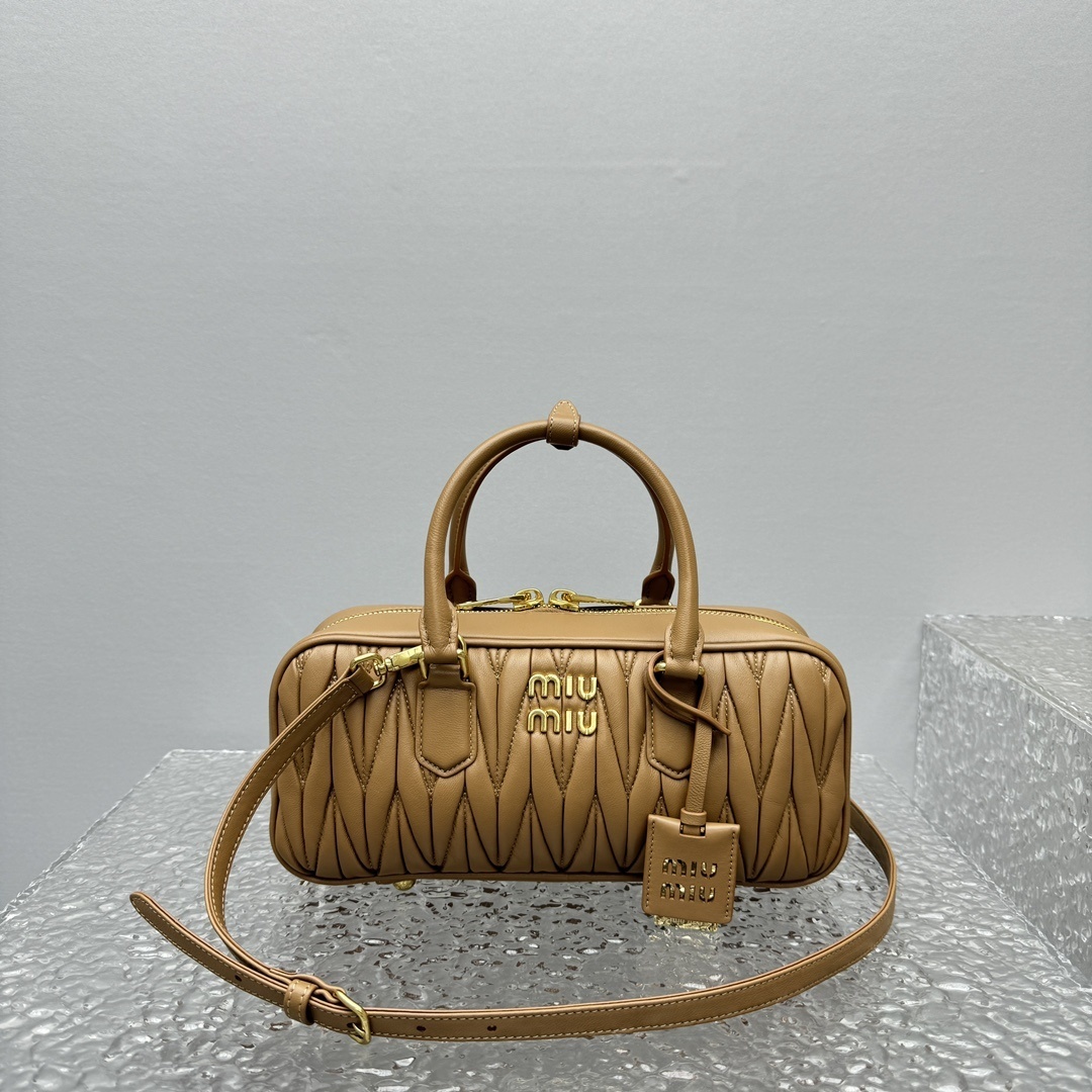 Miu Miu Arcadie matelasse nappa leather top-handle bag in a brown