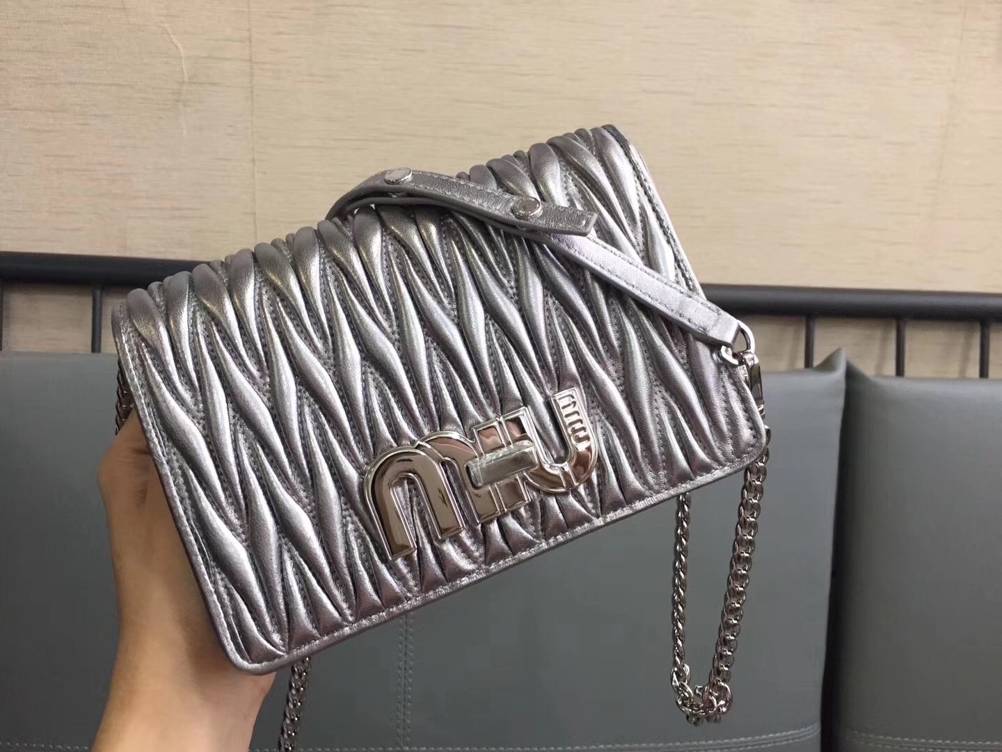 Miu Miu Matelasse shoulder bag in a silver chrome finish.