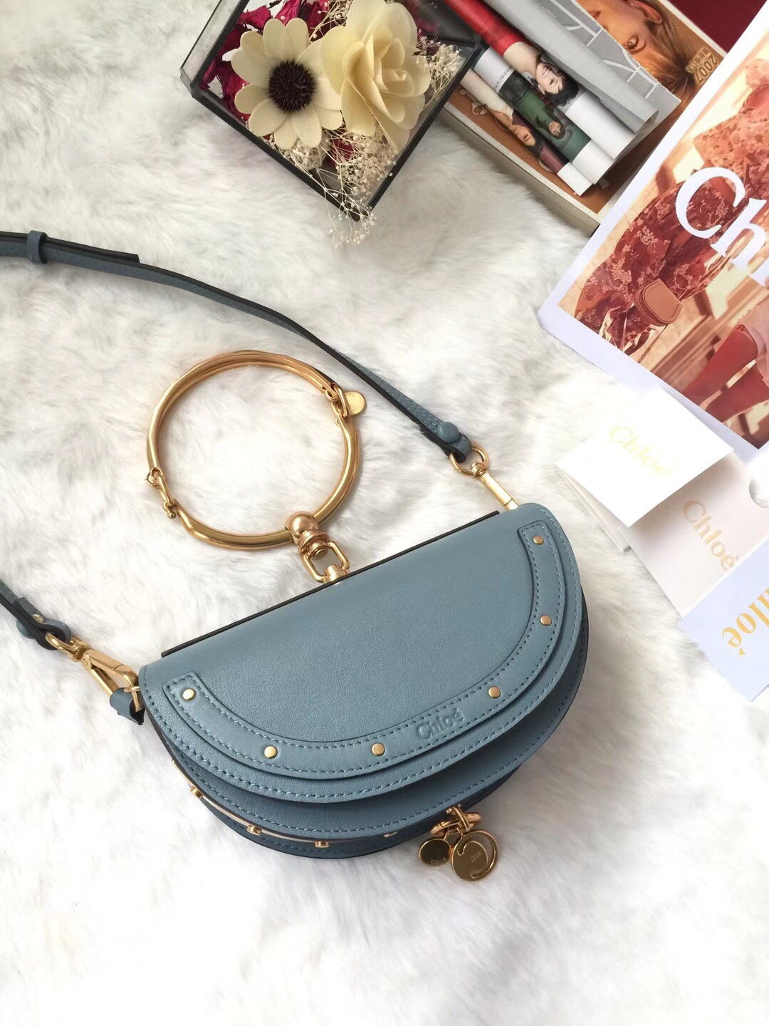 Chloe Nile small bracelet minaudière bag in blue leather with gold-tone hardware