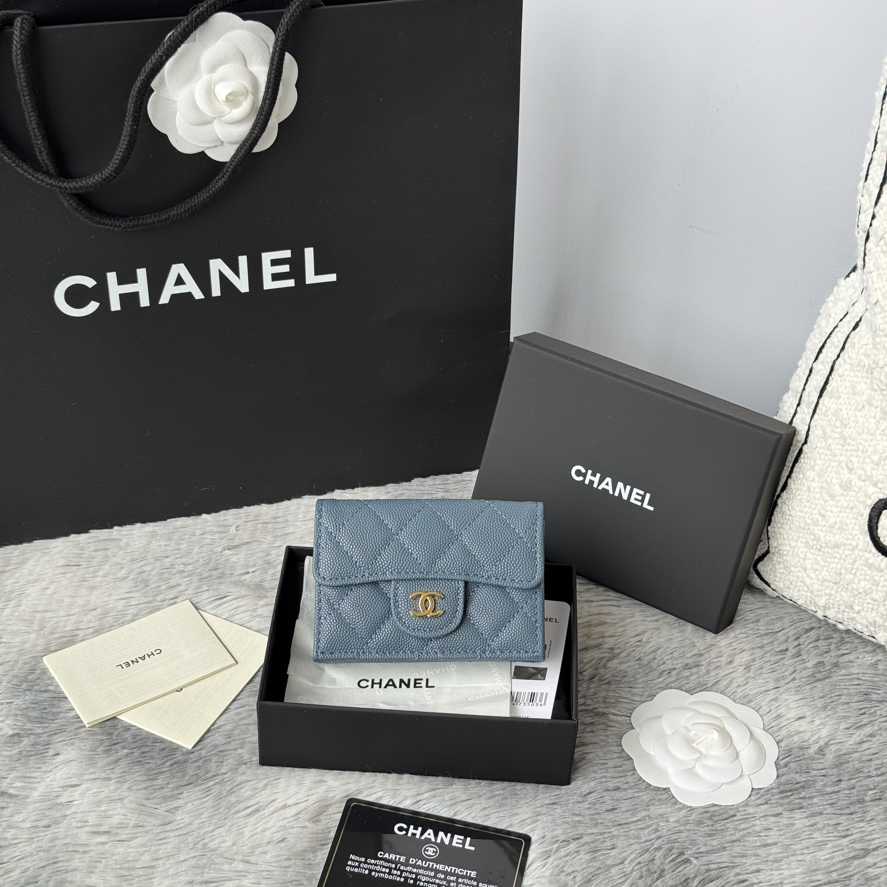 Chanel small dual-sided card and coin purse in sky blue caviar leather with gold-tone hardware