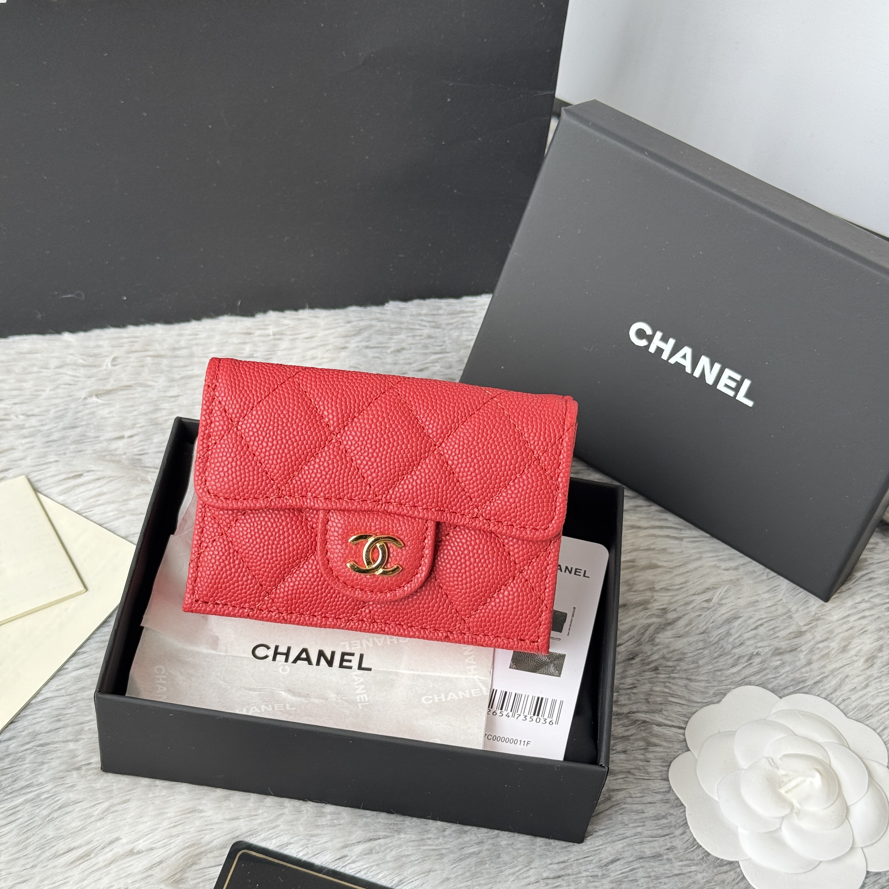 Chanel Classic Flap Card Holder in red caviar leather with gold-tone hardware