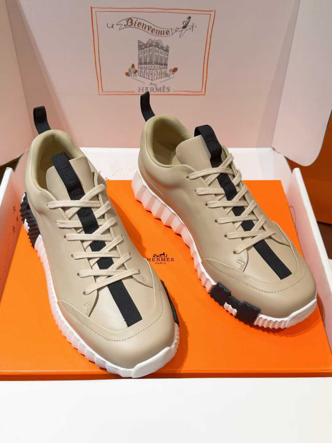 Hermès Bouncing sneakers in a beige or light brown colorway