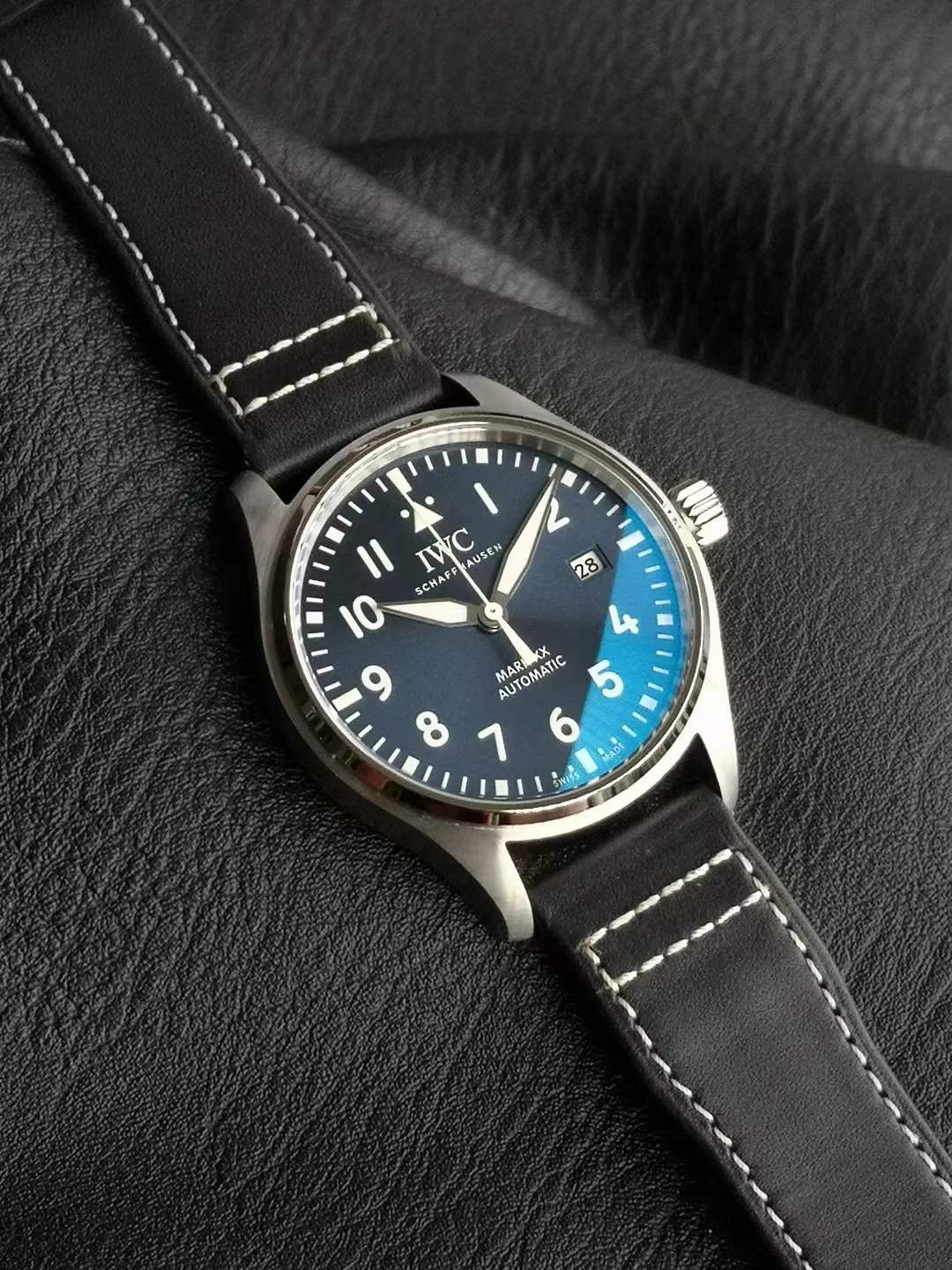 IWC Pilot's Watch Mark XX 40mm in stainless steel with a blue dial and a black leather strap