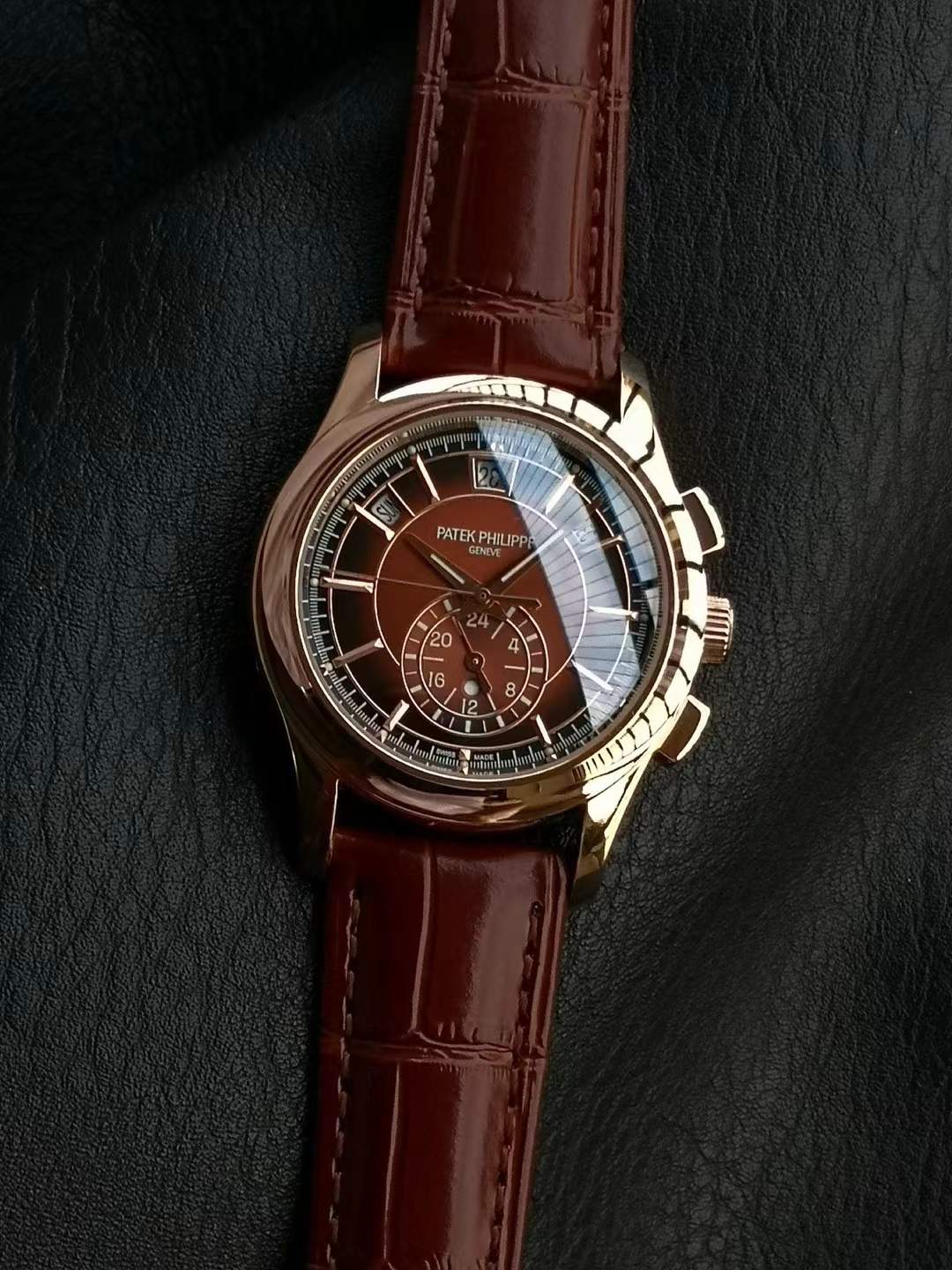 Patek Philippe Complications Annual Calendar Chronograph ref. 5905R-001 in a rose gold case with a brown dial and a shiny brown crocodile leather strap