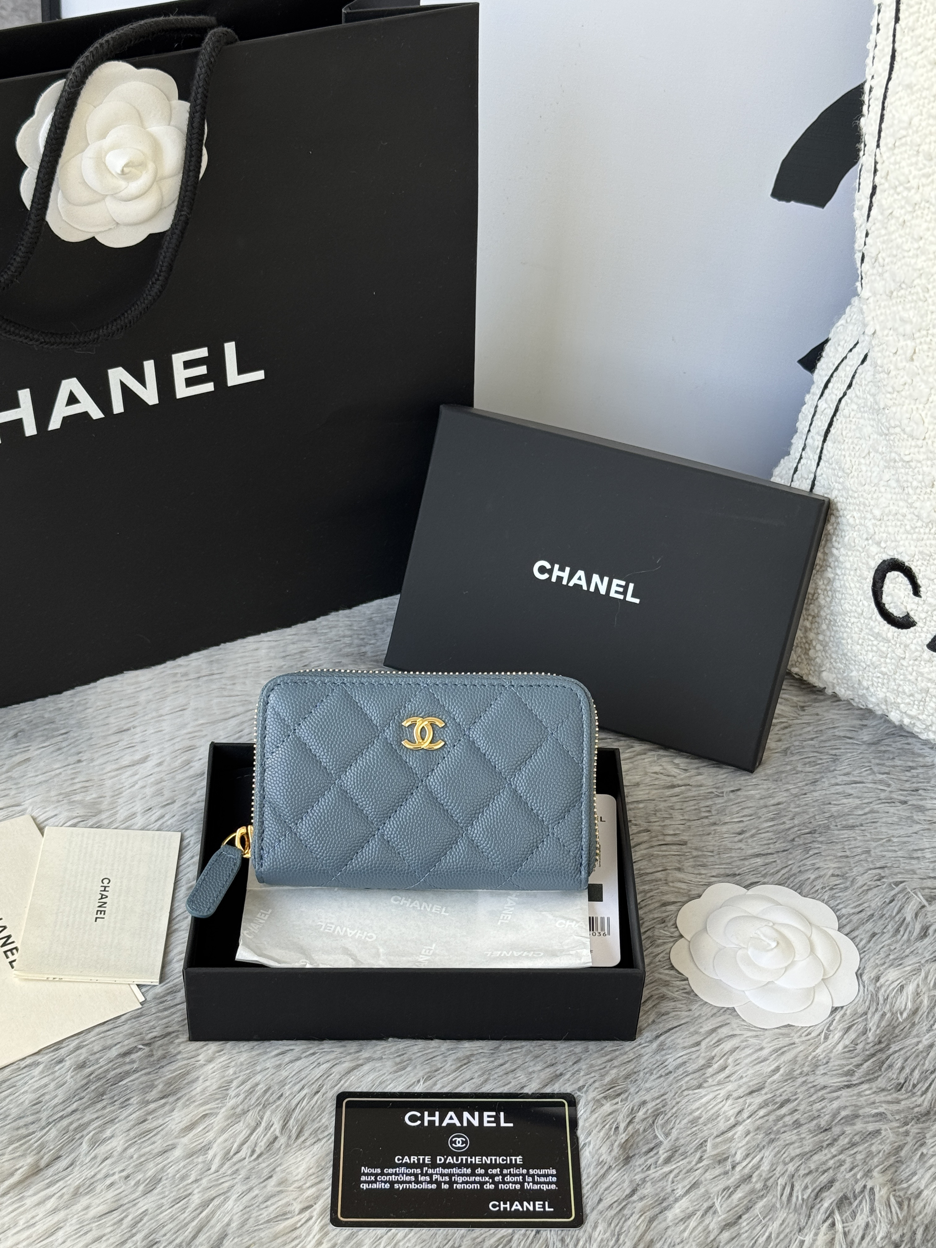 Chanel Classic Zipped Coin Purse in light blue caviar leather with light gold hardware