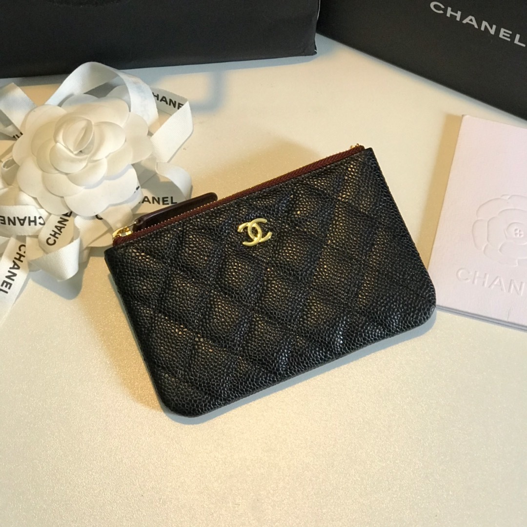 Chanel Classic Mini Pouch in black quilted caviar leather