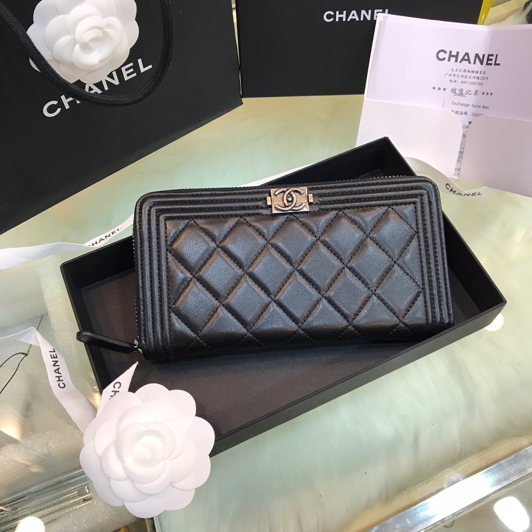 Chanel Boy long zipper wallet in black quilted lambskin leather