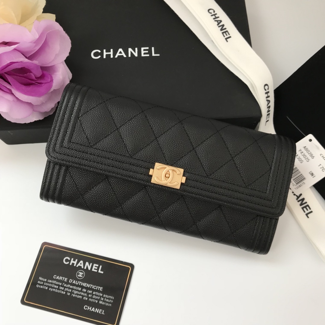 Chanel Boy Flap Long Wallet in black quilted caviar leather