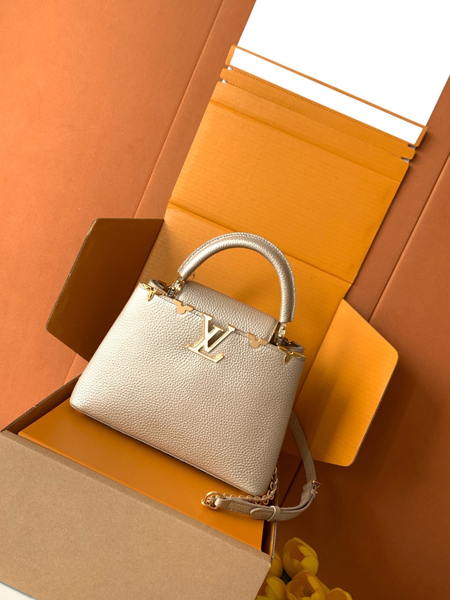 lv Capucines BB handbag in grained Taurillon leather