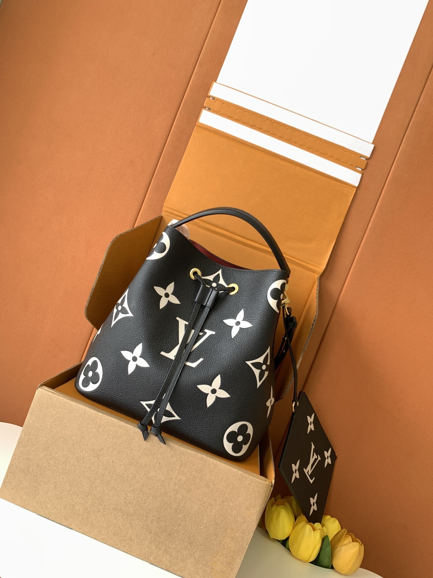 LV NeoNoe MM bucket bag in black Bicolor Monogram Empreinte leather