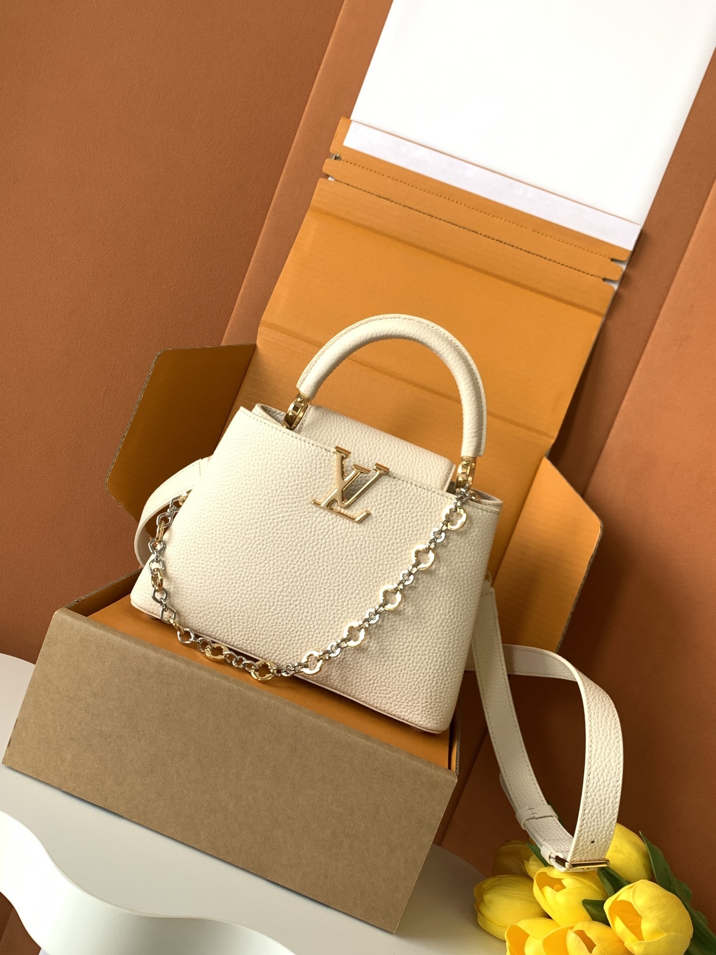 LV Capucines handbag in white Taurillon leather