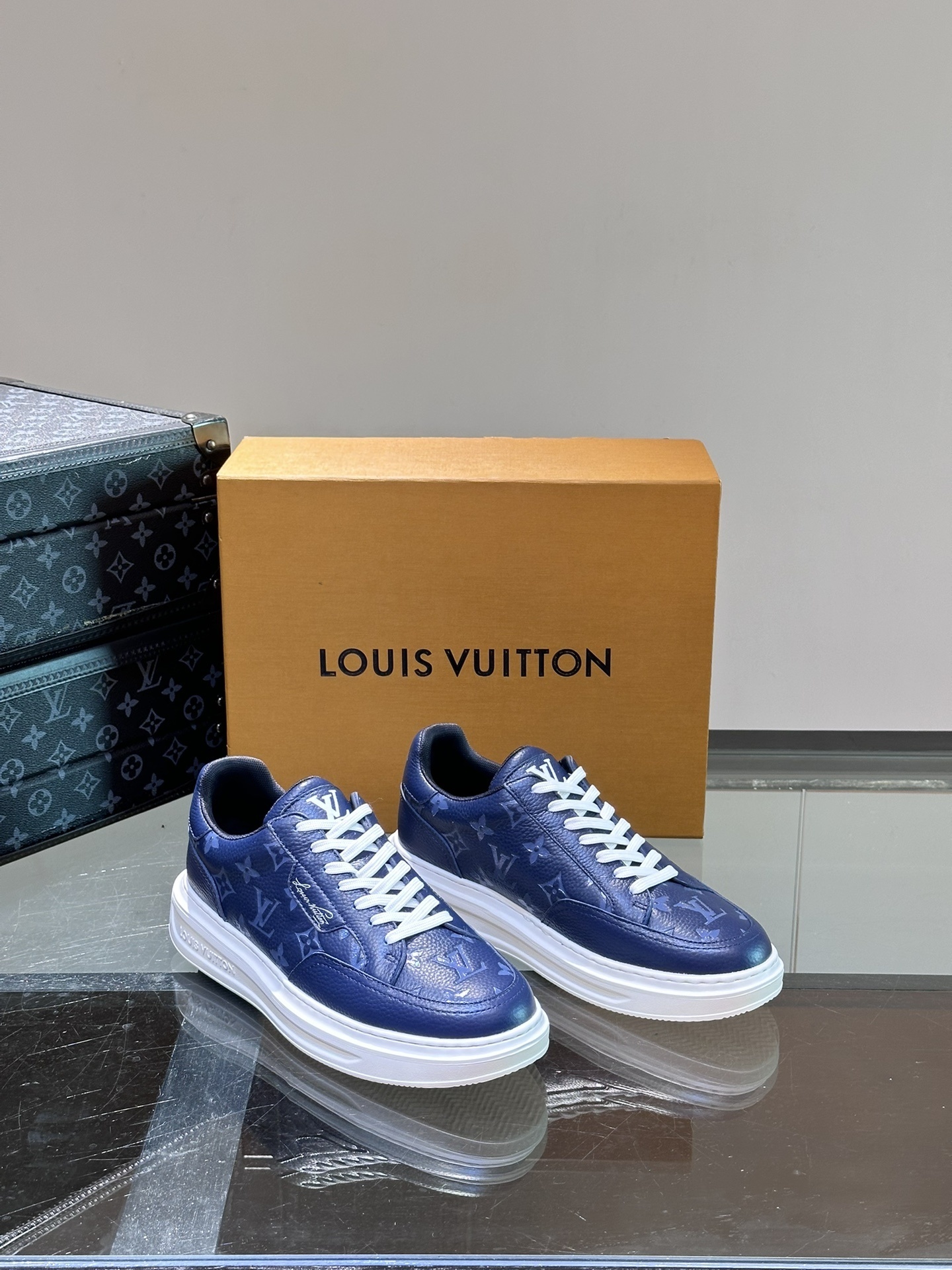 LV Beverly Hills sneaker in blue monogram-embossed grained calf leather with white laces
