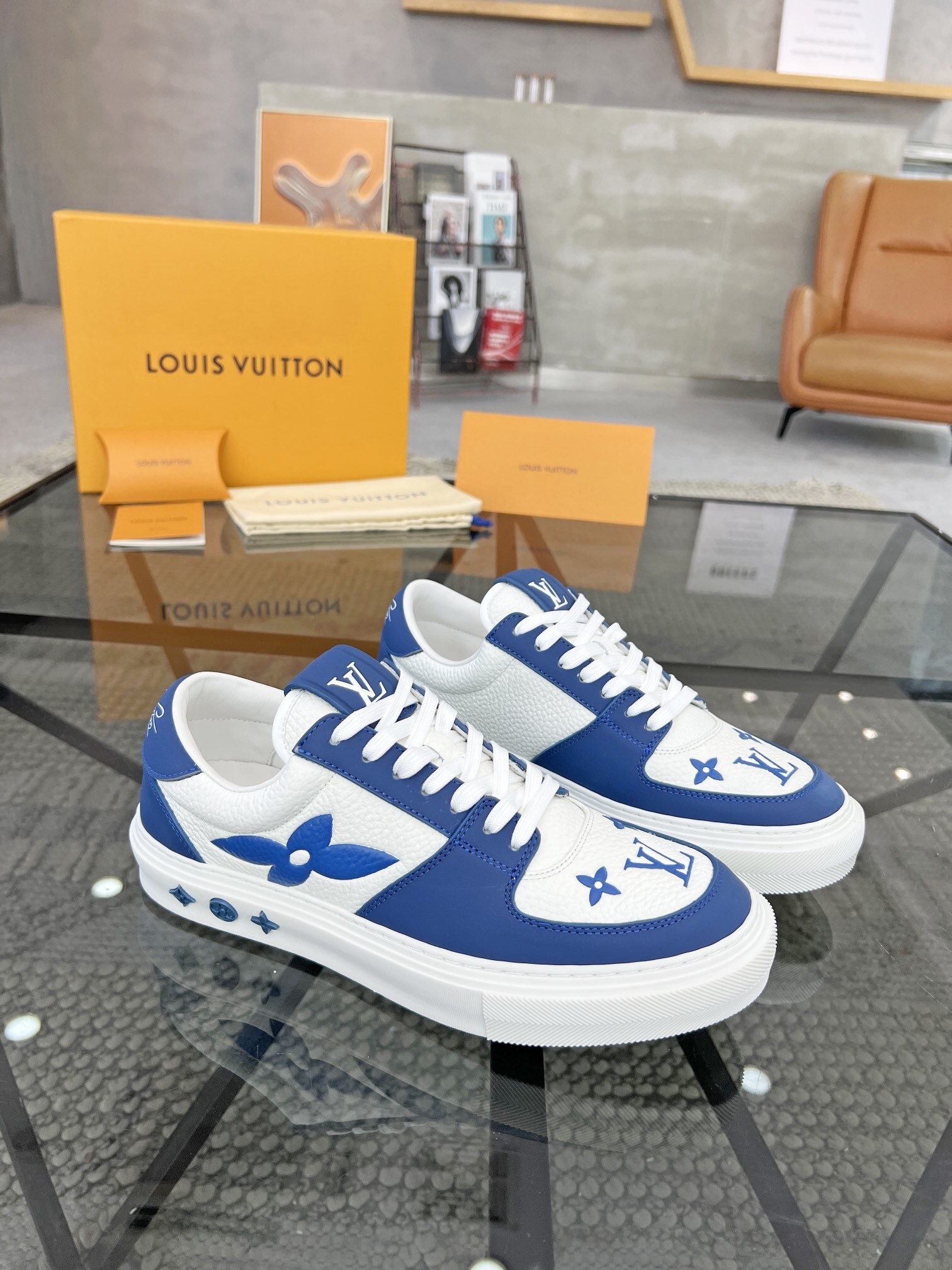 LV Trainer sneakers in a white and blue