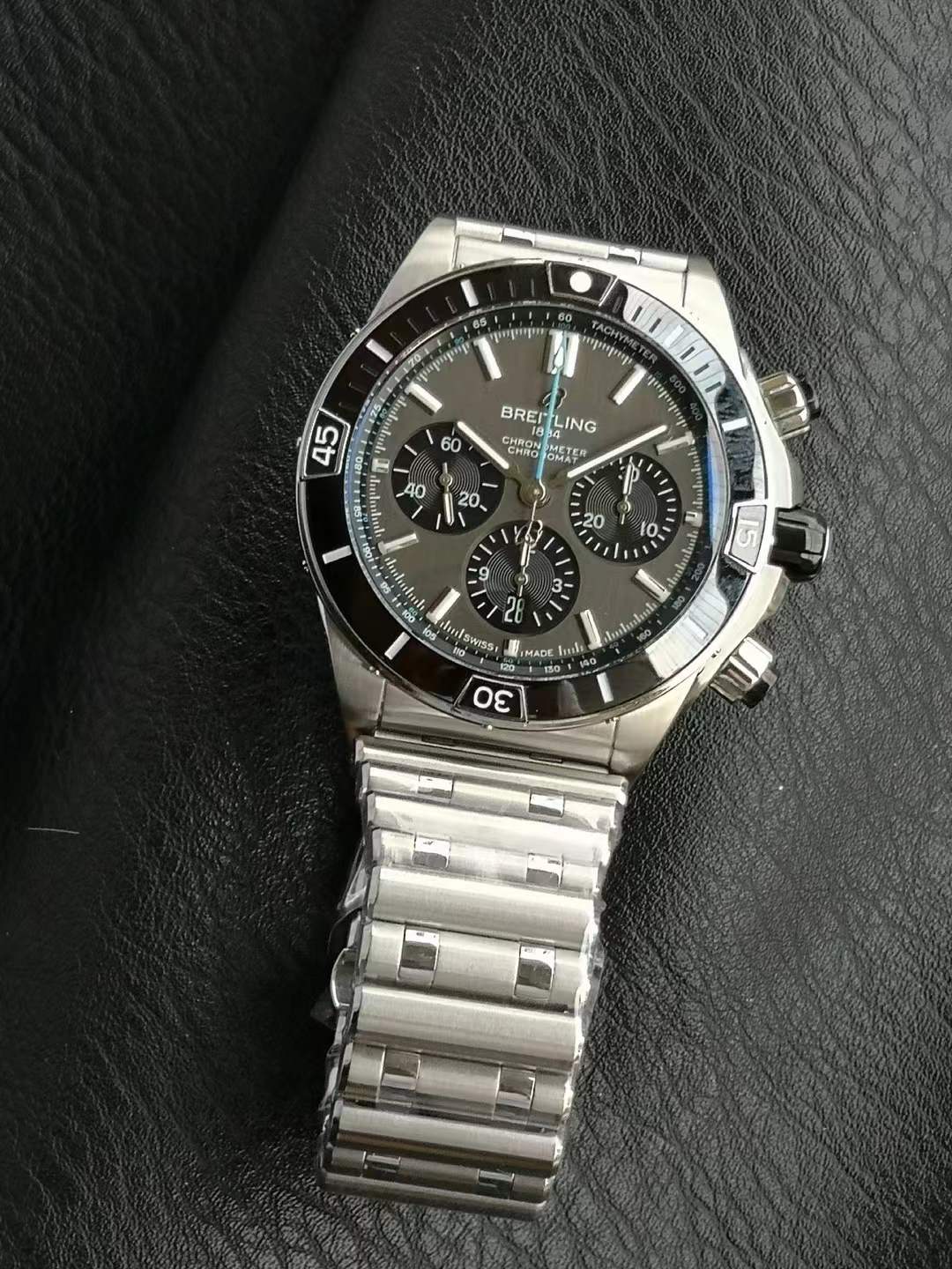Breitling Super Chronomat B01 44mm men's watch with a grey dial and titanium bracelet