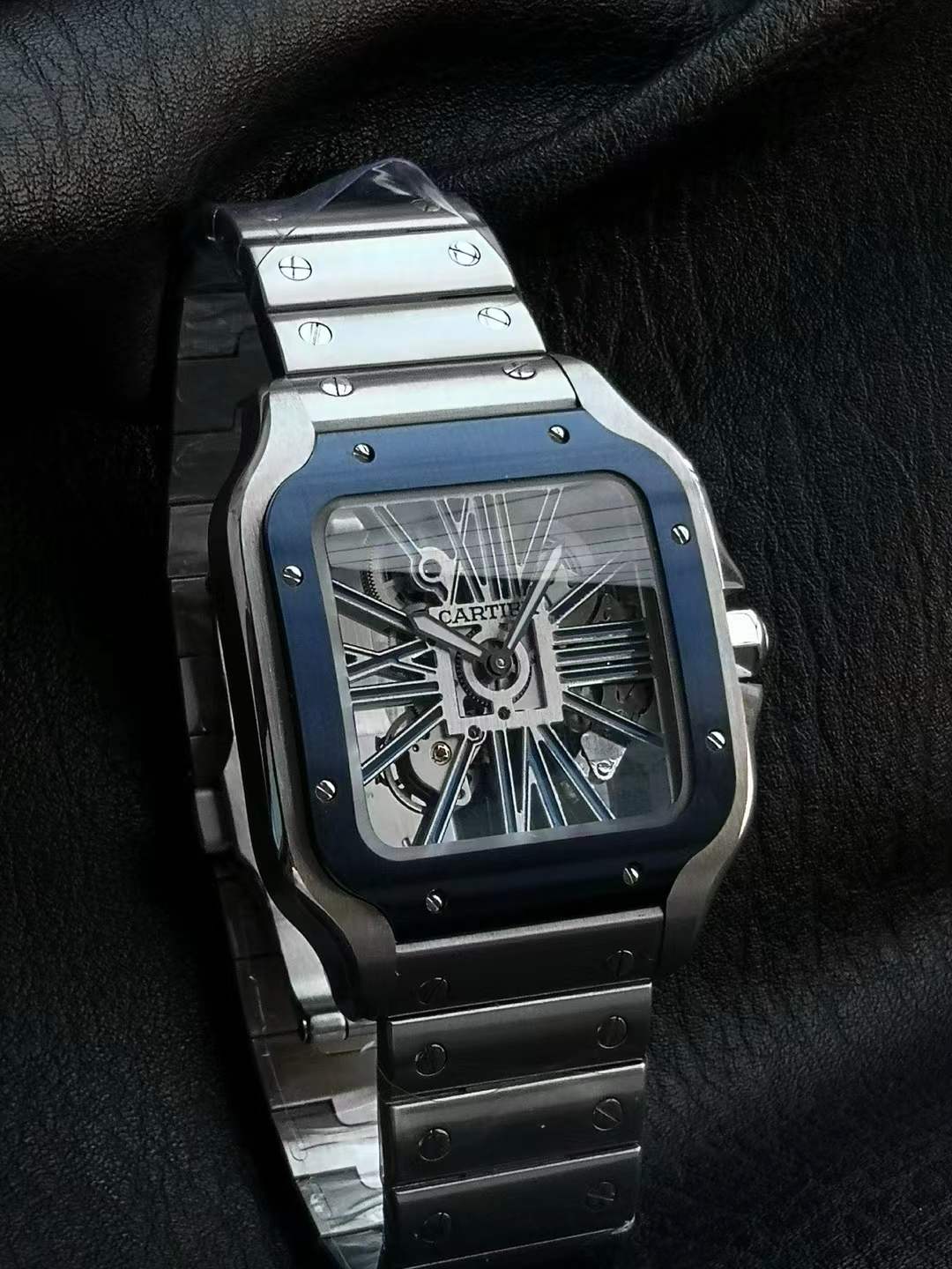 Cartier Santos de Cartier large model skeleton watch with a blue bezel and steel case Rich factory