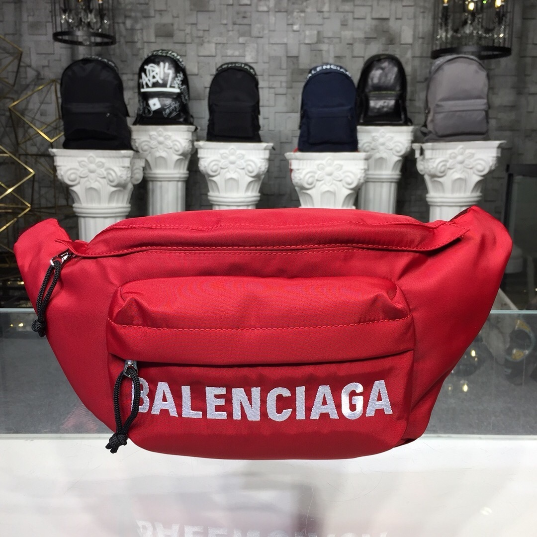 Balenciaga Wheel Belt Bag in red recycled nylon with a logo embroidered on the front