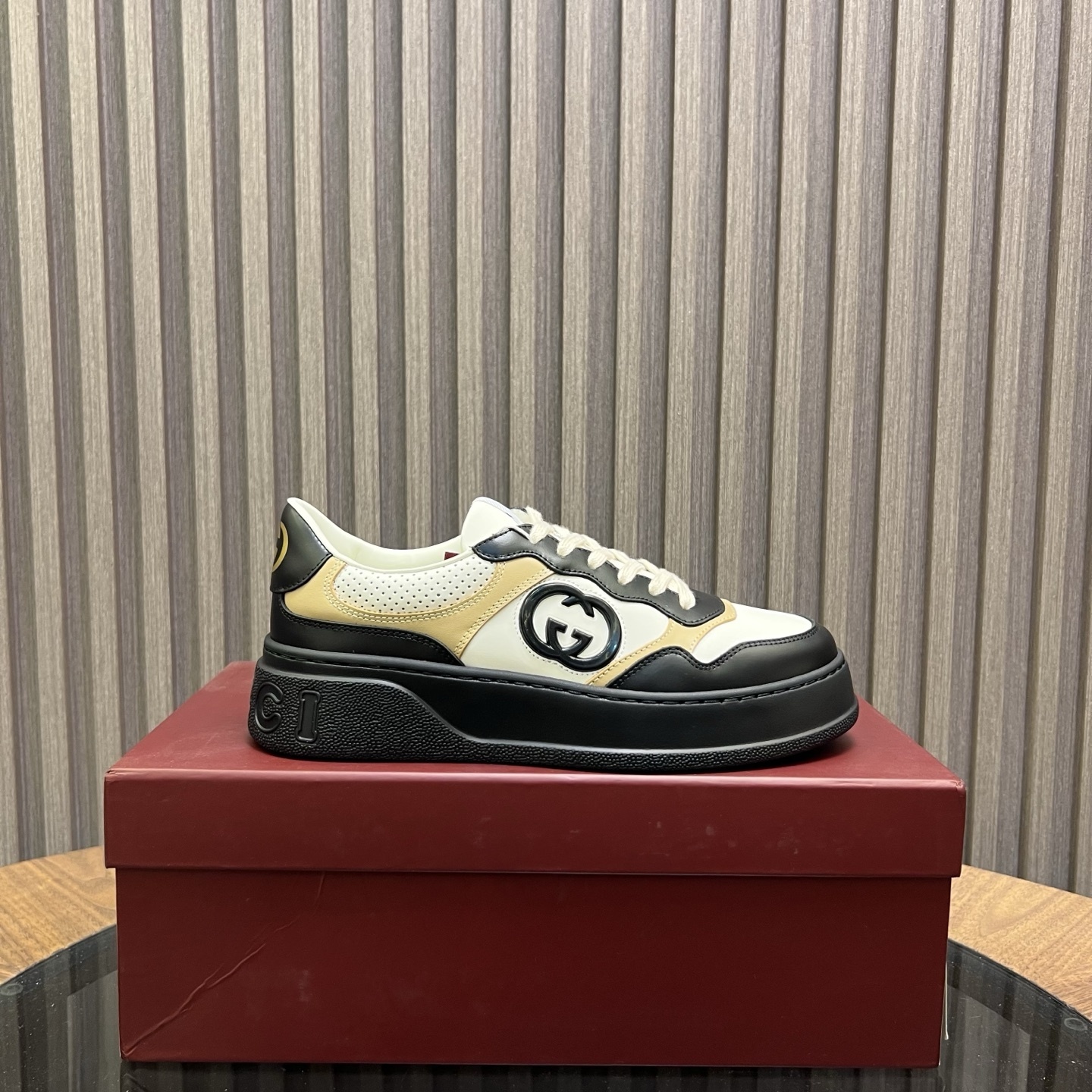 Gucci GG Embossed Sneaker in black and white leather