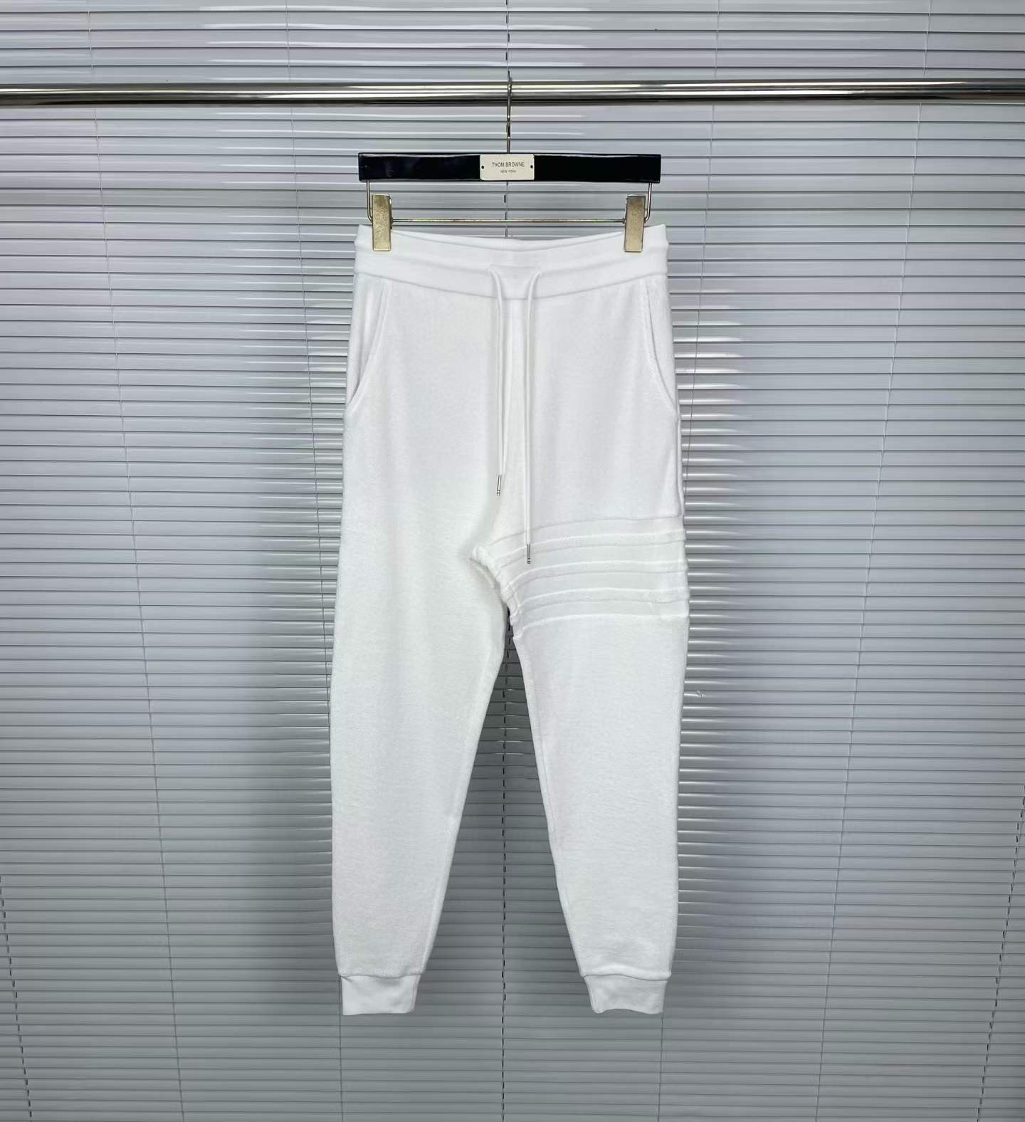 Thom Browne 4-Bar stripe cotton track pants in white