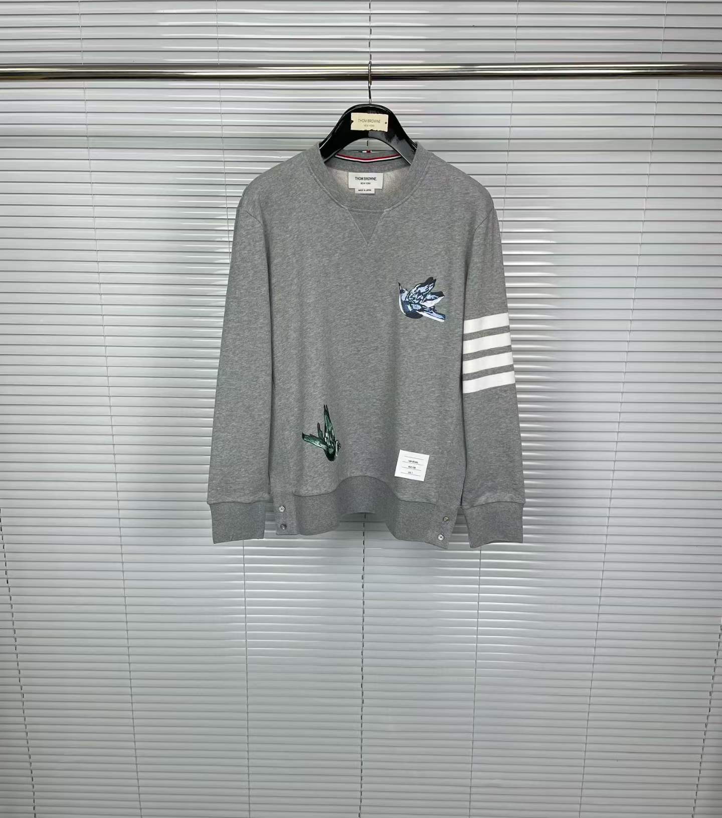 Thom Browne 4-Bar bird-appliqué sweatshirt in grey cotton loopback.