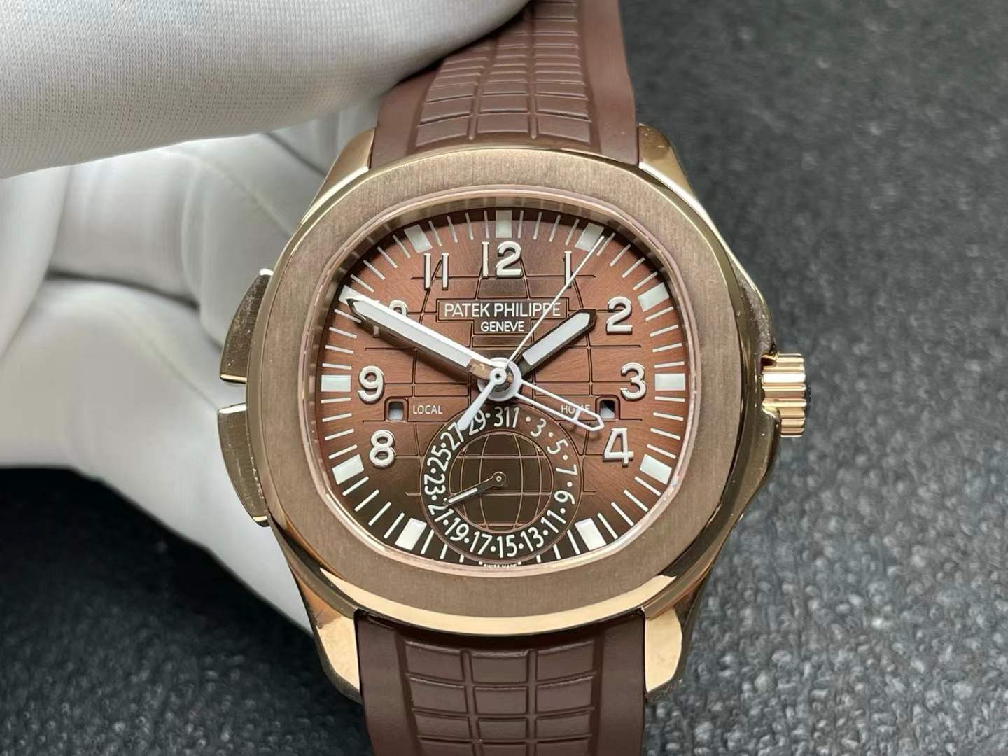 Patek Philippe Aquanaut Travel Time reference 5164R-001 in rose gold with a brown dial and strap