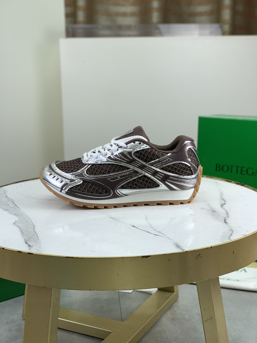 Bottega Veneta Orbit sneaker in a brown and silver colorway