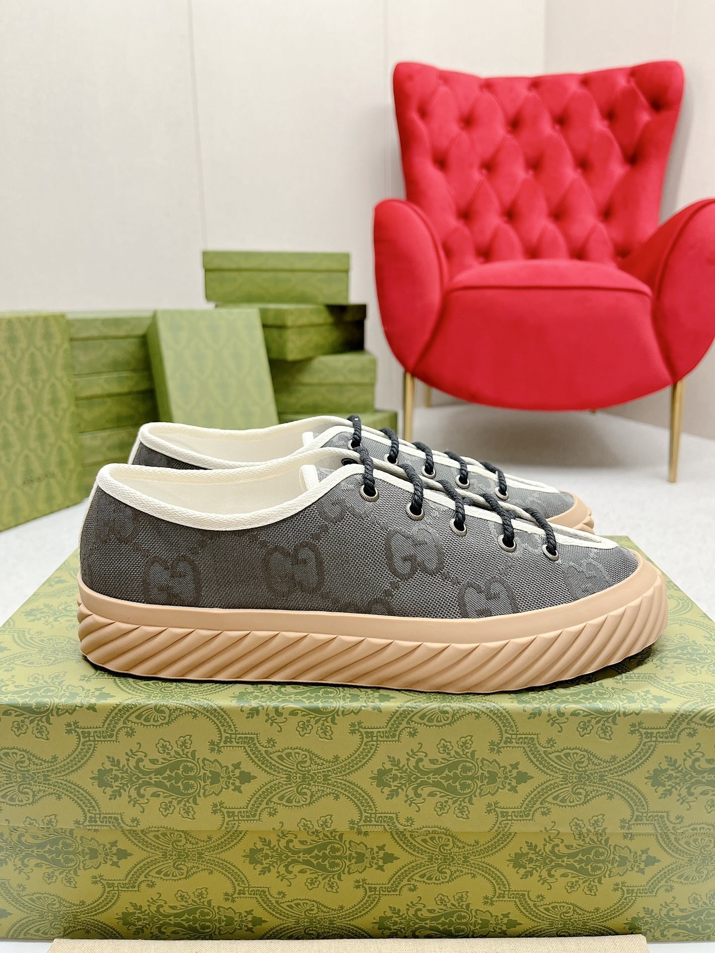 Gucci canvas sneaker with a ridged rubber sole