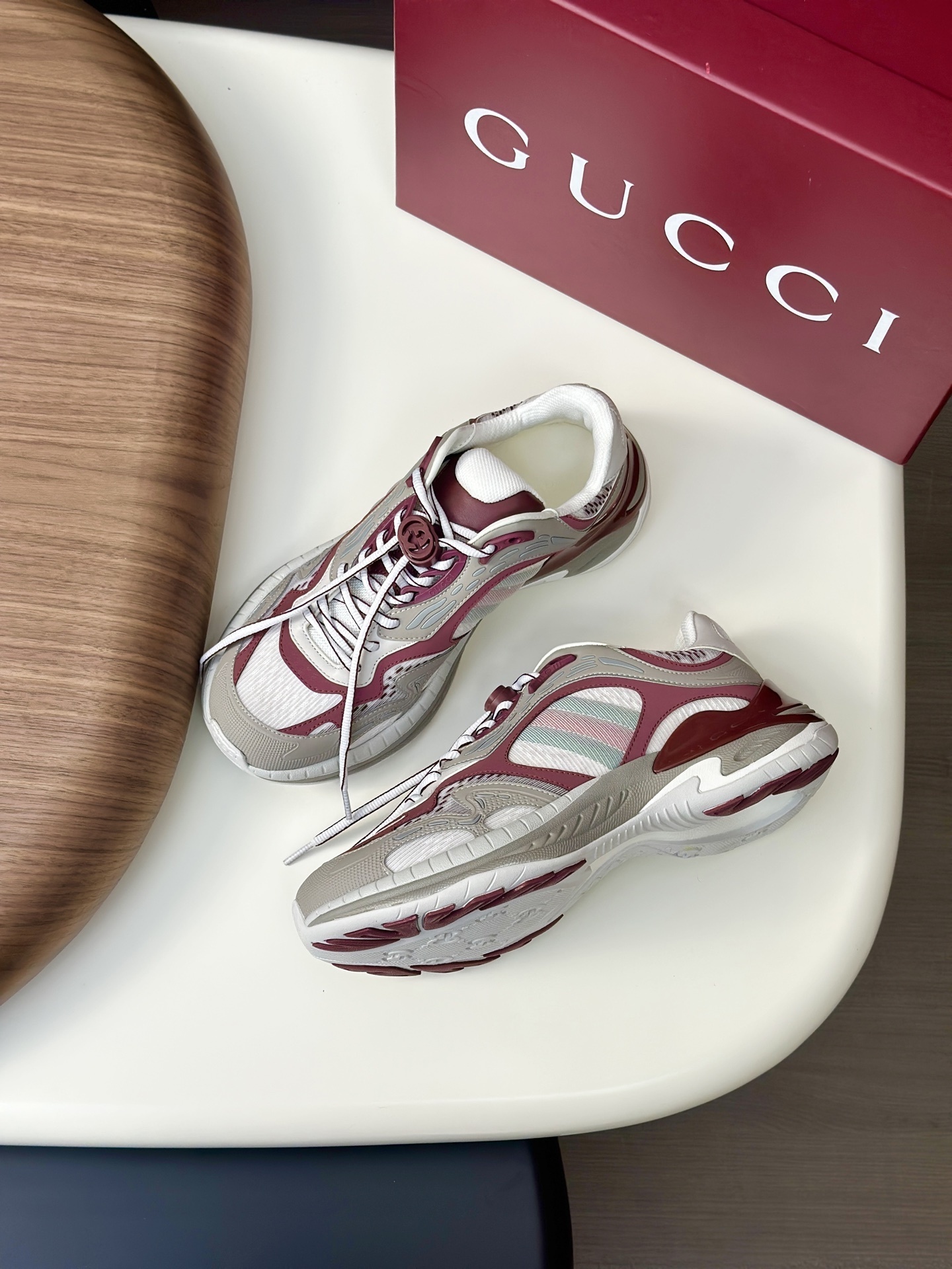 Gucci 2.0 sneaker in the grey and Rosso Ancora mesh and leather colorway