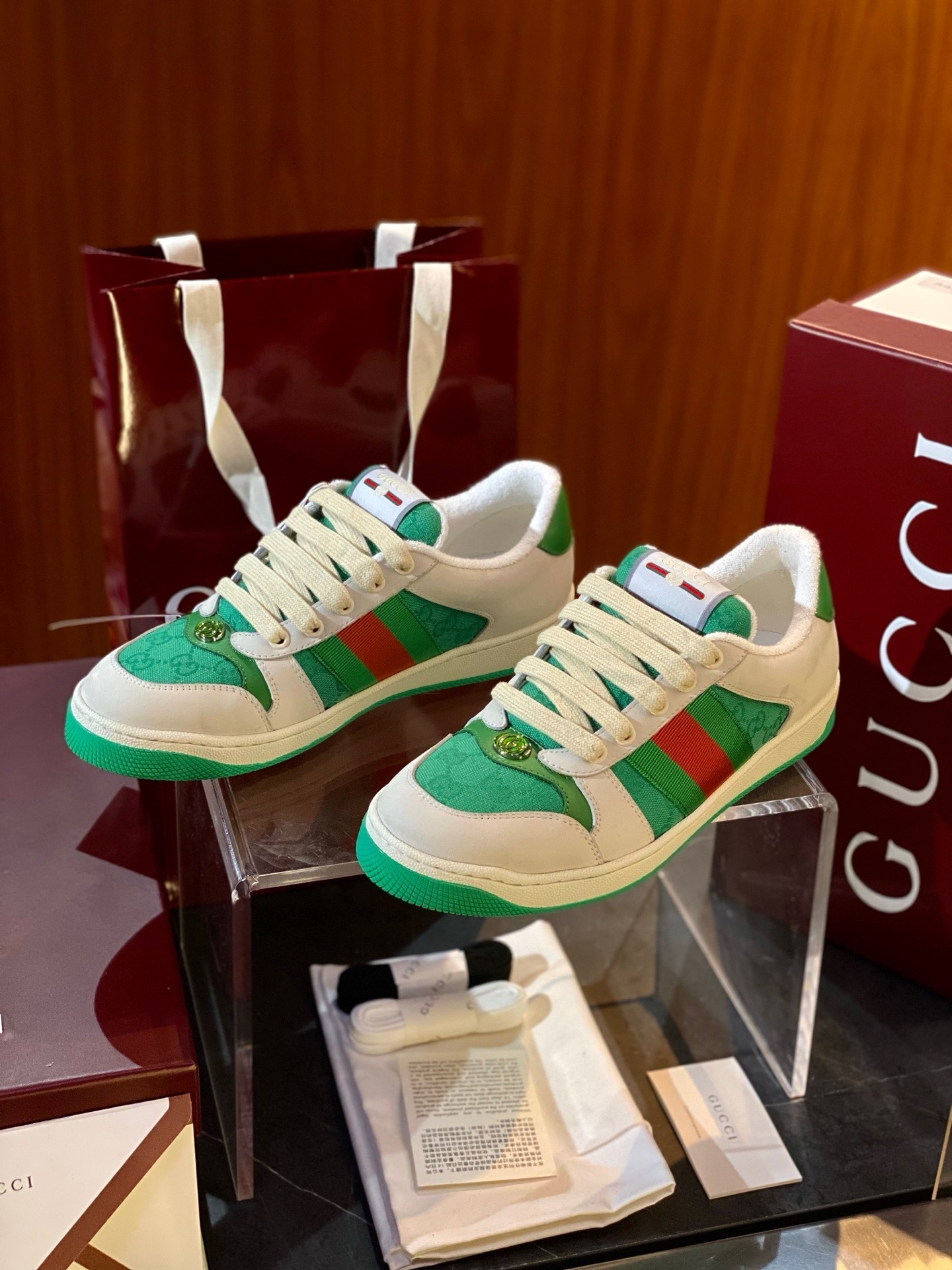Gucci Screener sneakers with the signature green and red Web stripe