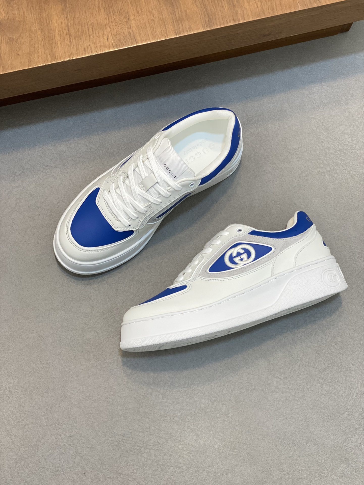 Gucci MAC80 sneaker in white leather with blue accents.