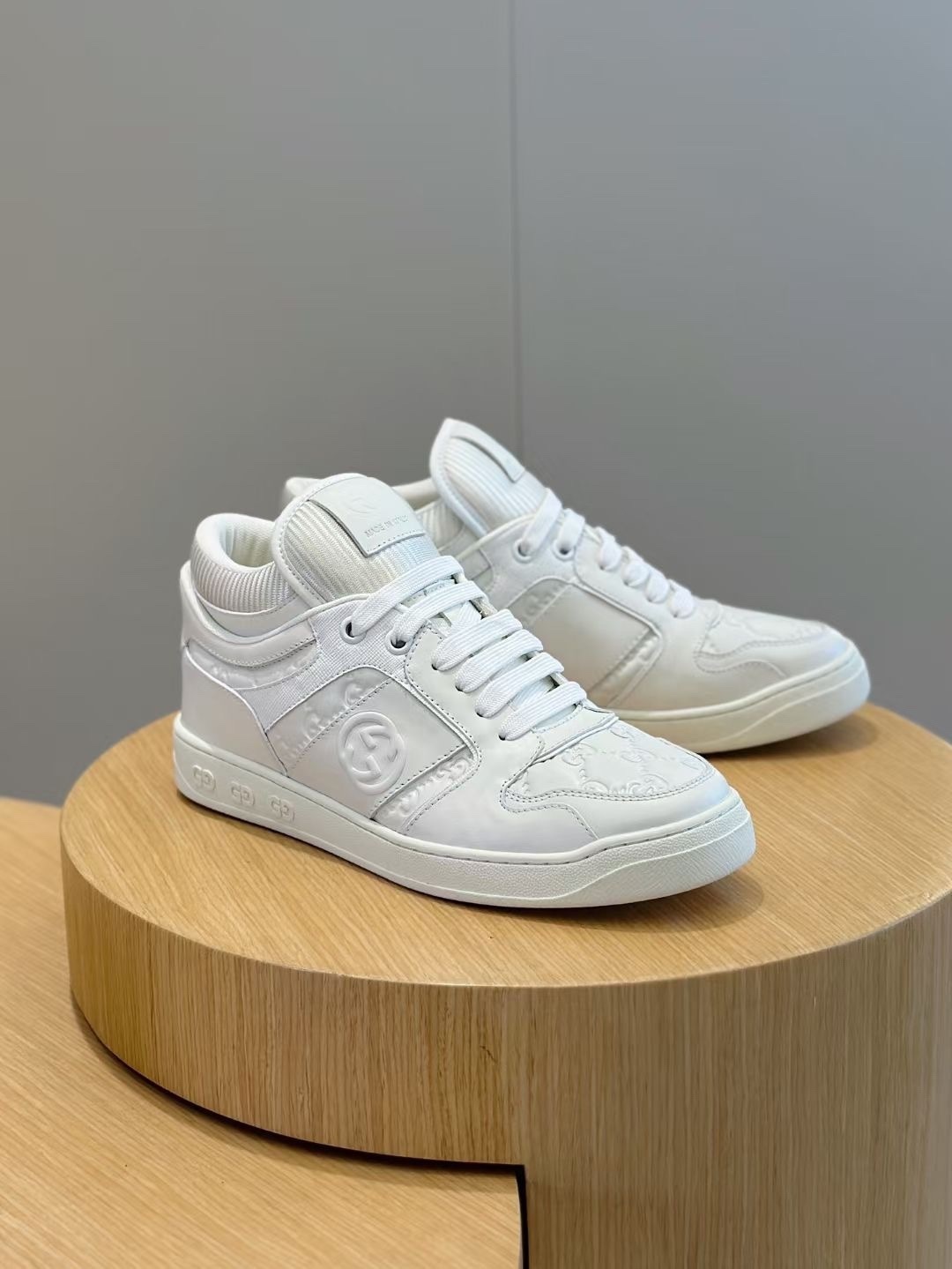 Gucci white GG embossed low-top sneaker