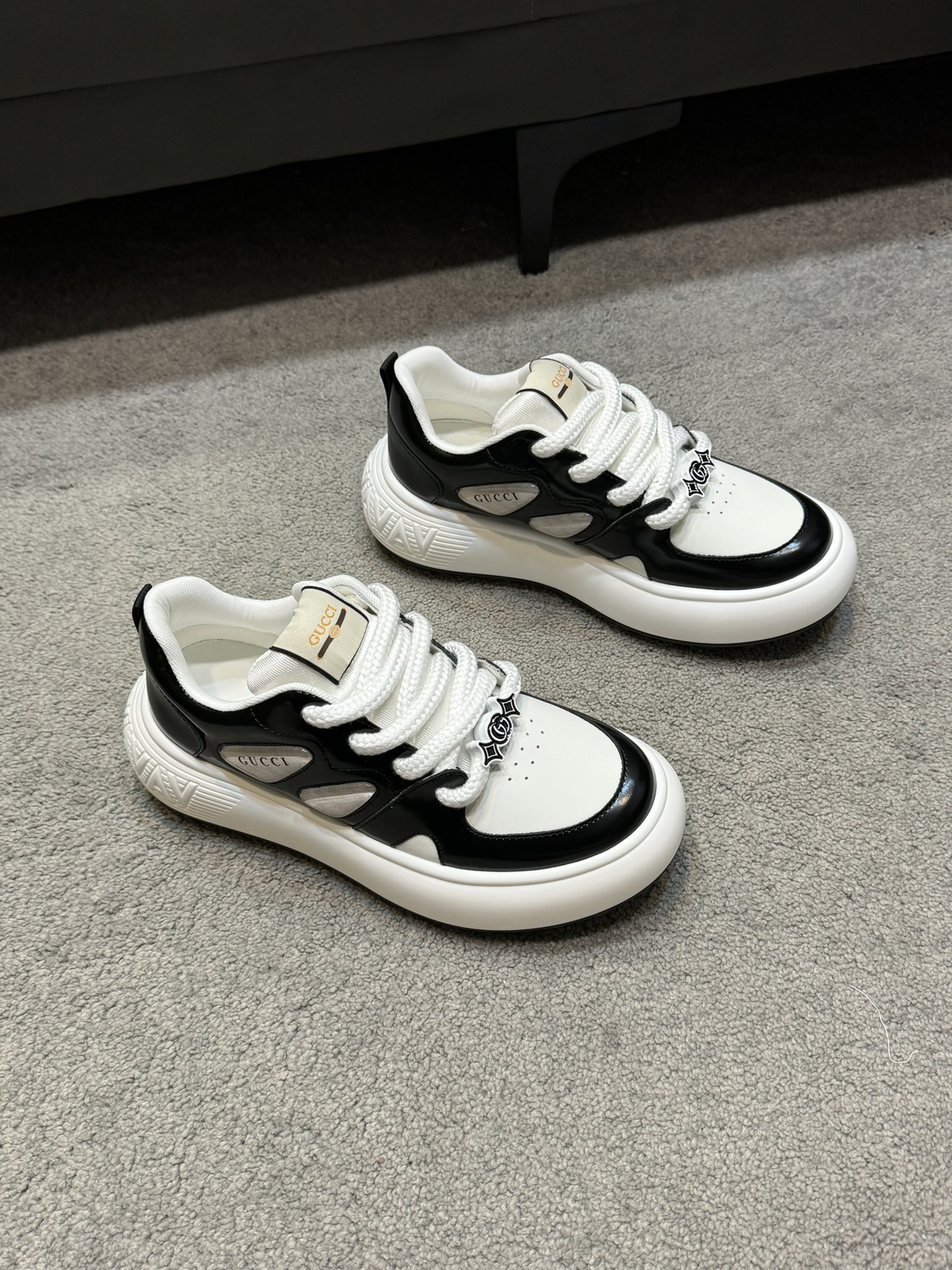 Gucci Run sneaker in black suede and white perforated fabric trim