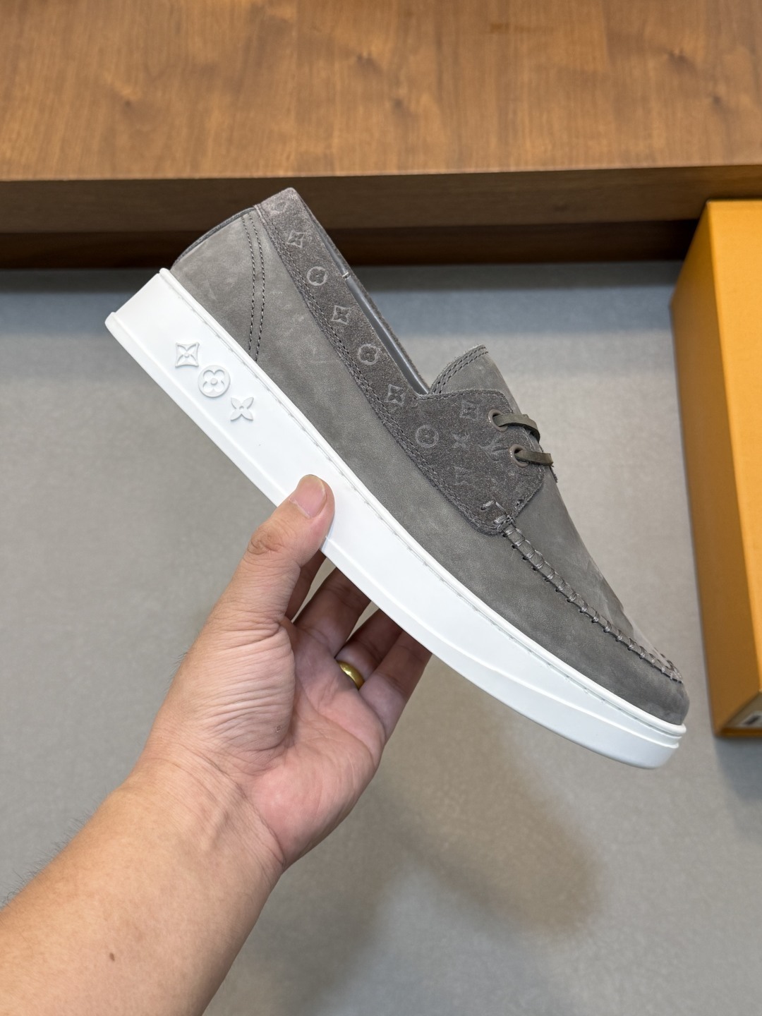 LV Resort loafer in soft gray suede calf leather with a contrasting white rubber outsole.