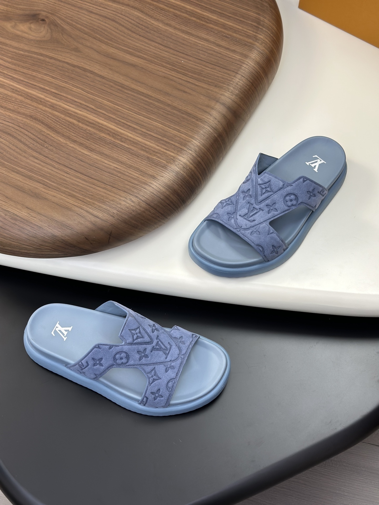 LV Oasis mule in a blue colorway calfskin leather