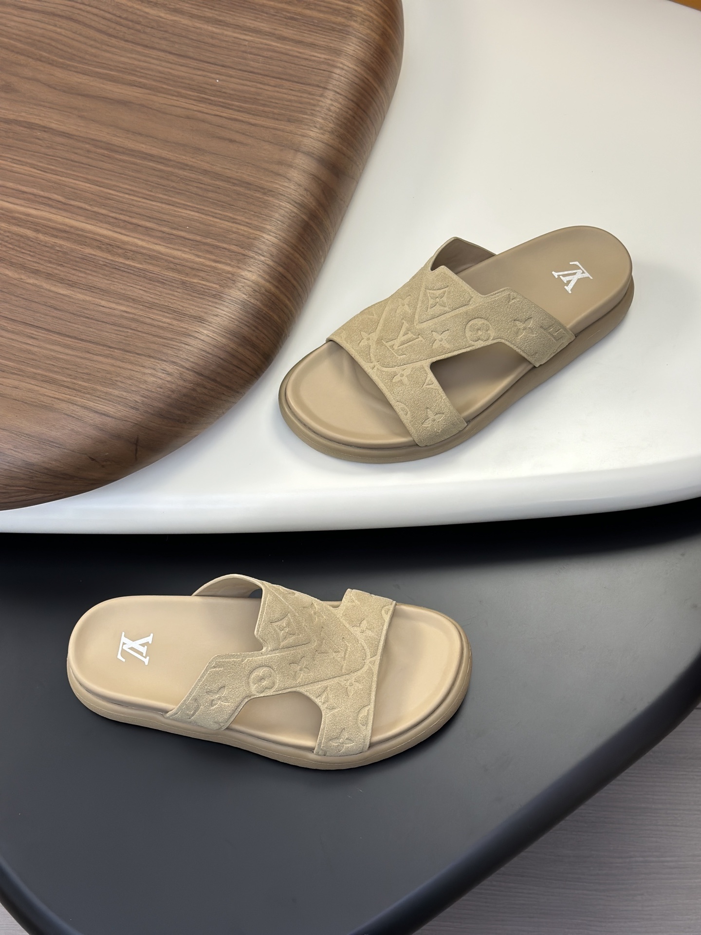 LV Oasis Mule sandal in a beige/tan color.