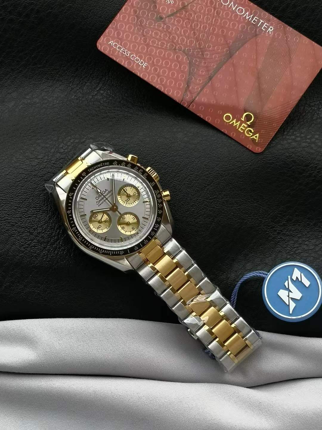Omega Speedmaster Moonwatch Professional Co-Axial Master Chronometer in stainless steel and 18K Moonshine™ Gold with a sun-brushed silvery "step" dial