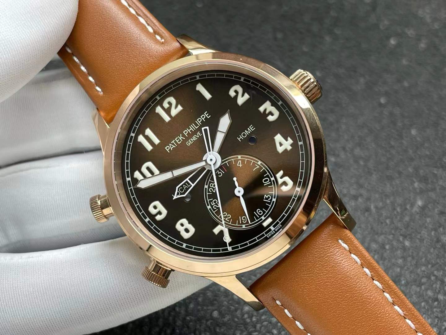 Patek Philippe Calatrava Pilot Travel Time ref. 5524R-001 in rose gold with a brown sunburst dial and a brown calfskin strap
