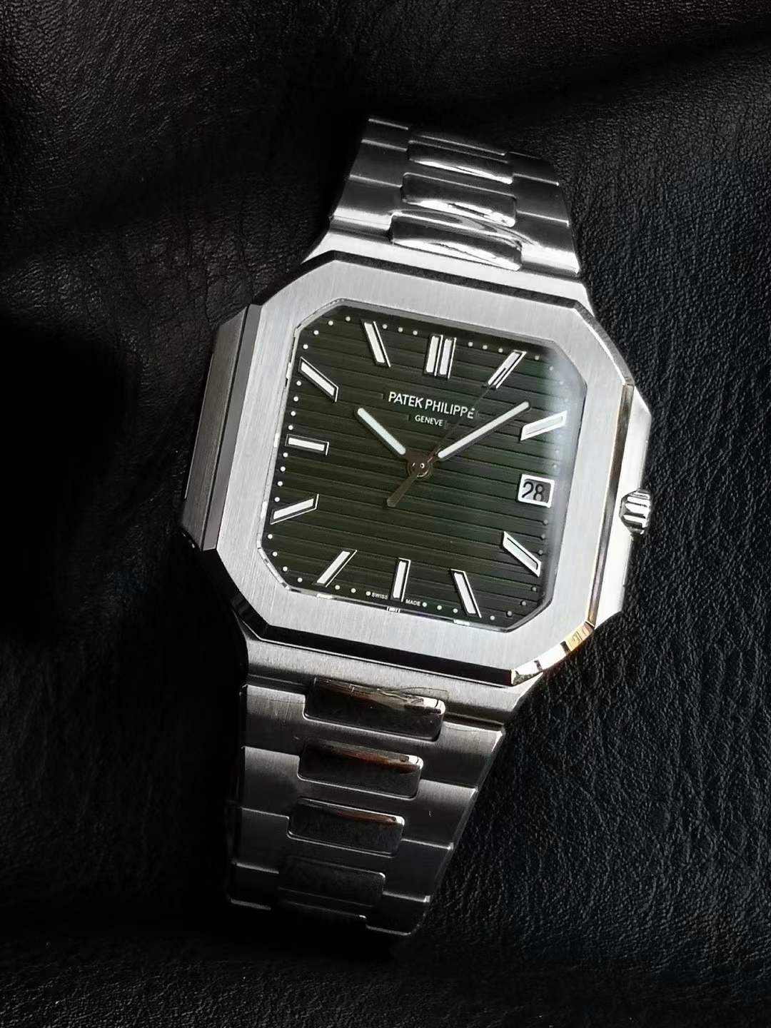 Patek Philippe Cubitus 5821/1A-001 watch in stainless steel with a sunburst olive green horizontally embossed dial