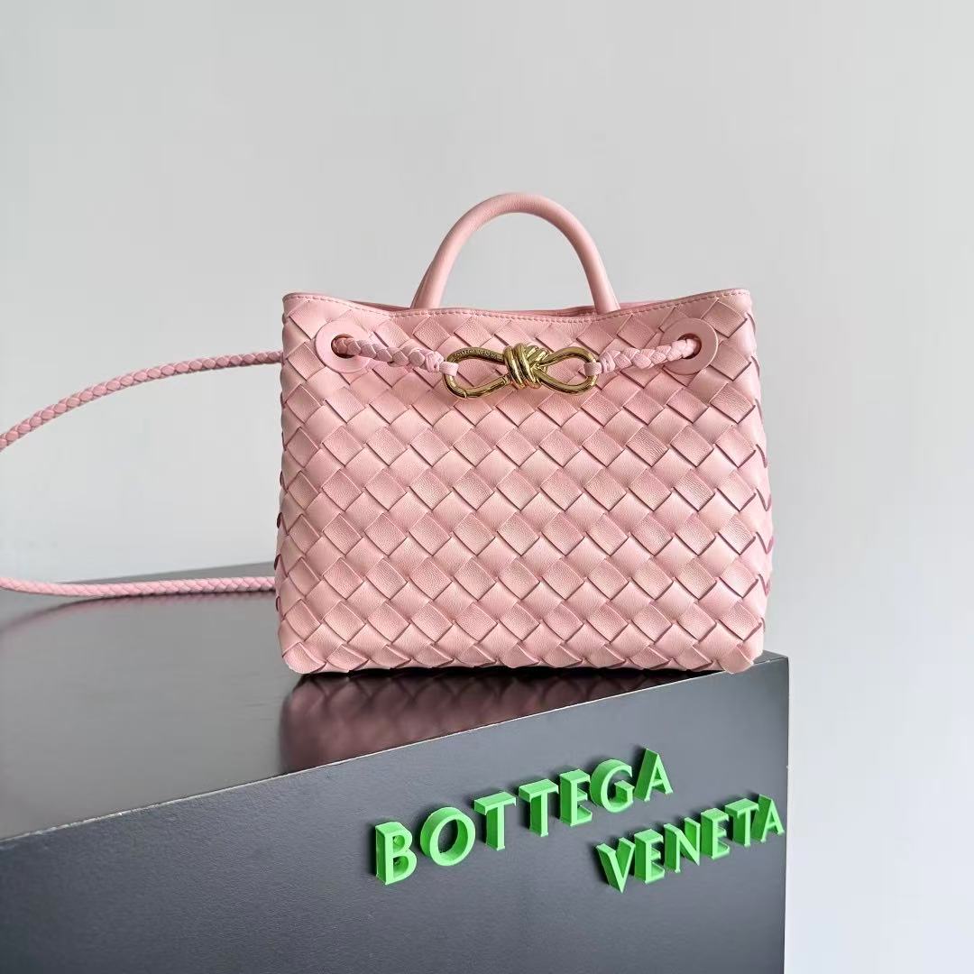 Bottega Veneta Small Andiamo top handle bag in pink intrecciato leather.