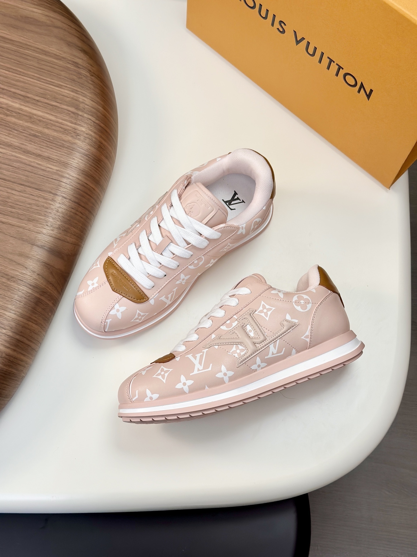 LV ButterSoft sneaker in a pink and white