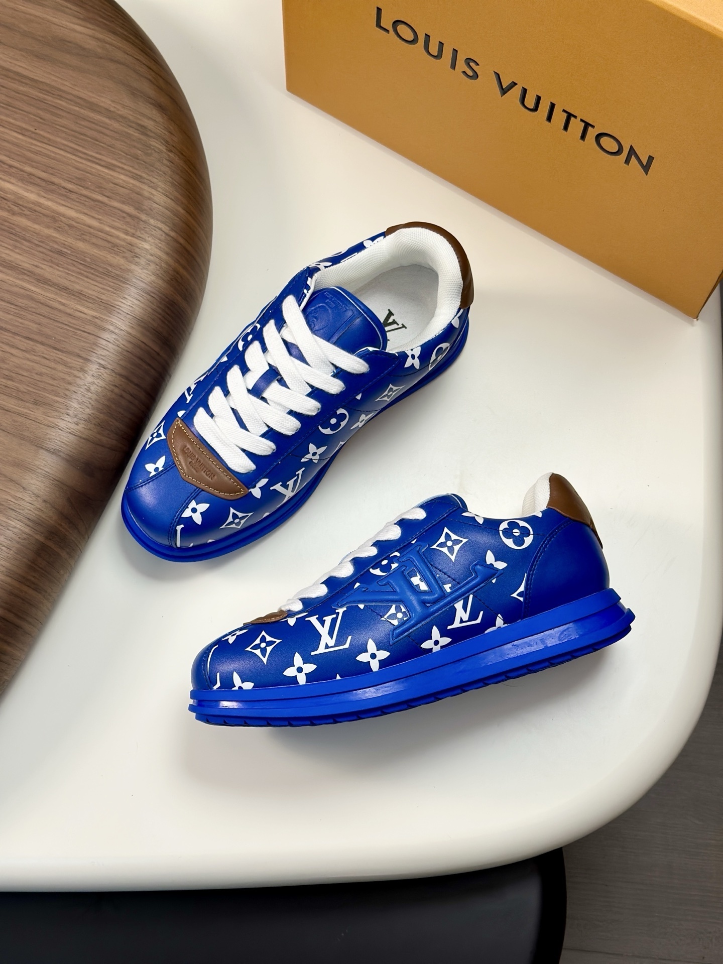 LV Buttersoft Sneaker in blue lambskin and calf leather with the iconic Monogram pattern